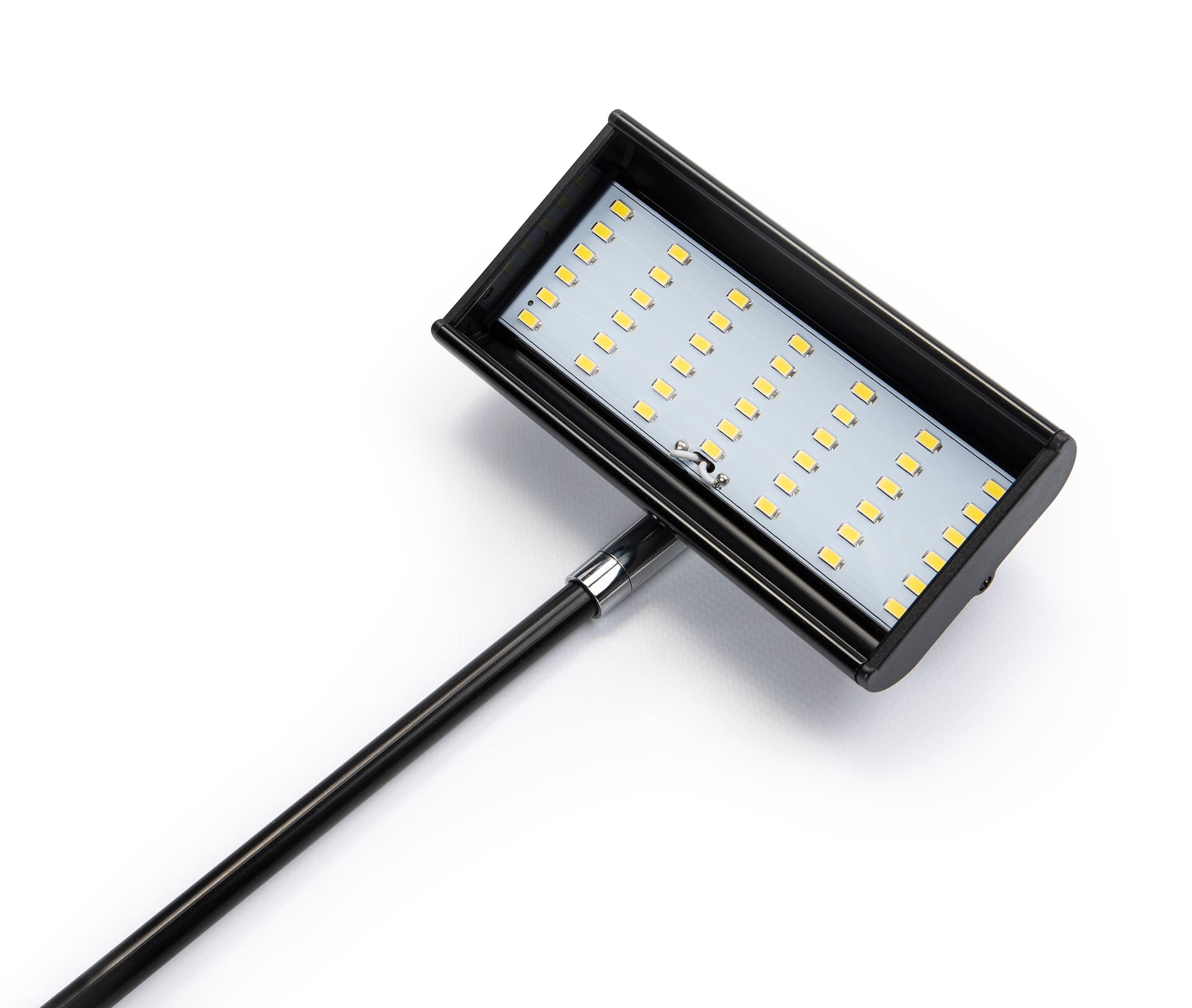 LED exhibit stem light with low profile tilting top