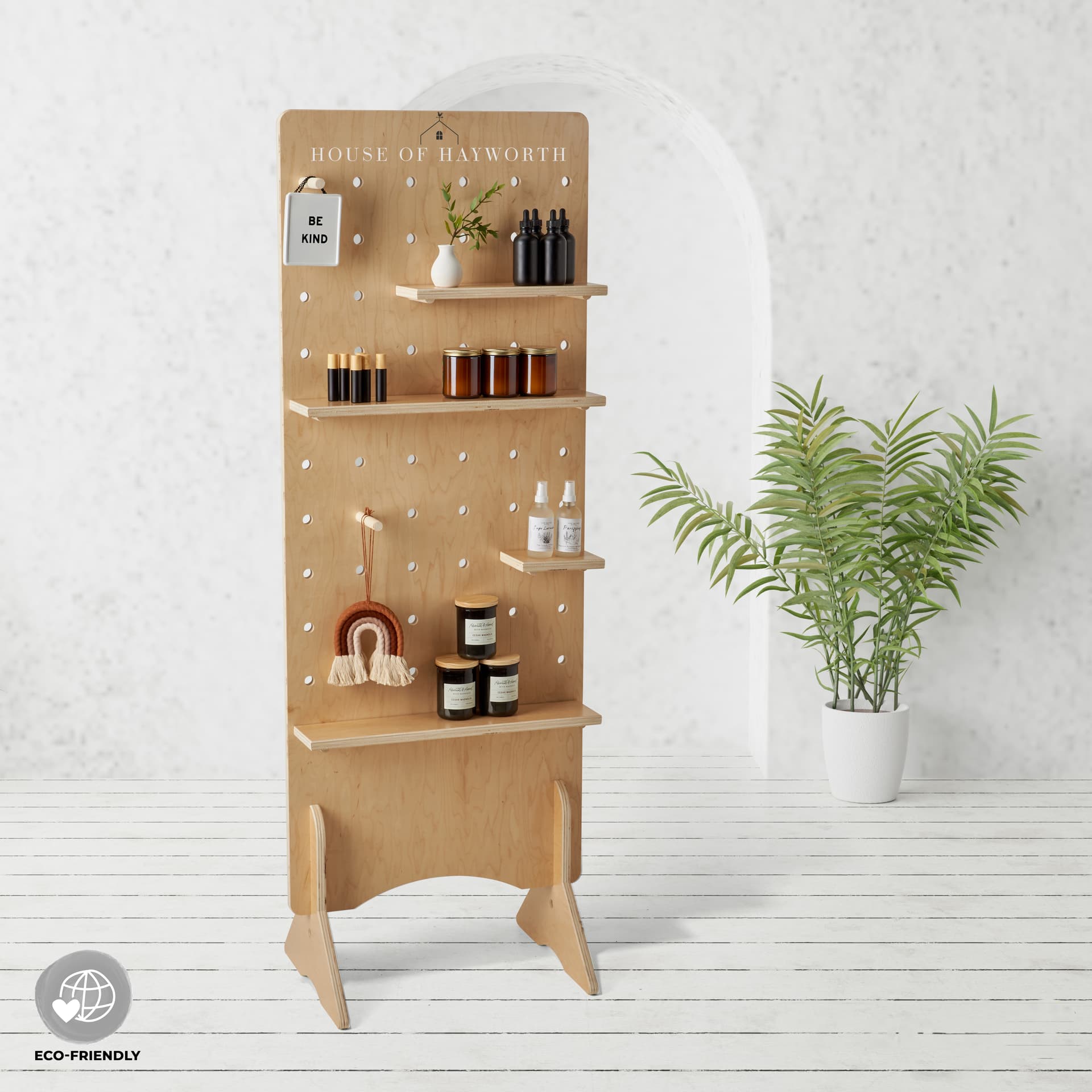 Personalized wooden pegboard floor display measures 69 inches tall 