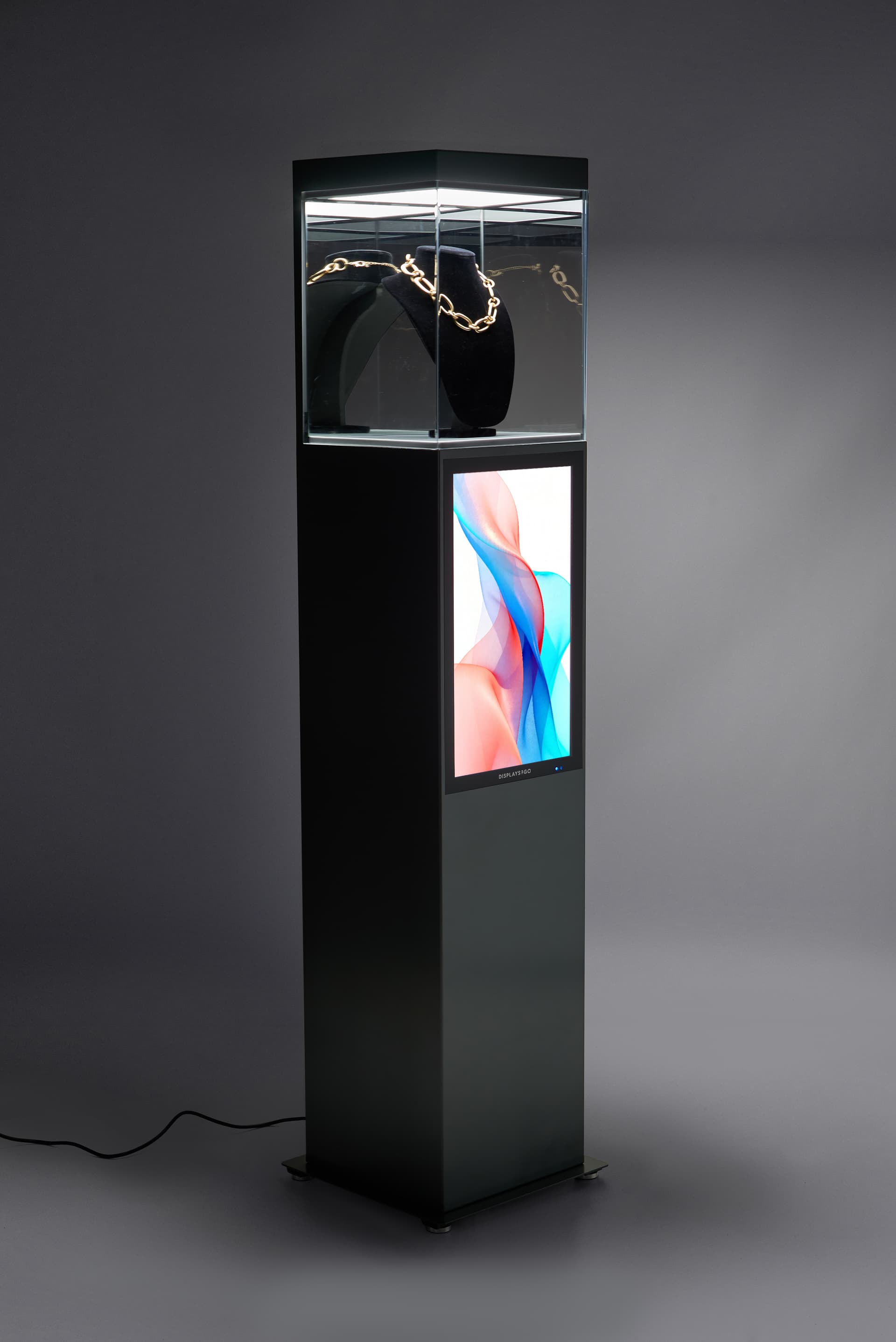 Exhibit pedestal case with video screen with dimmable showcase