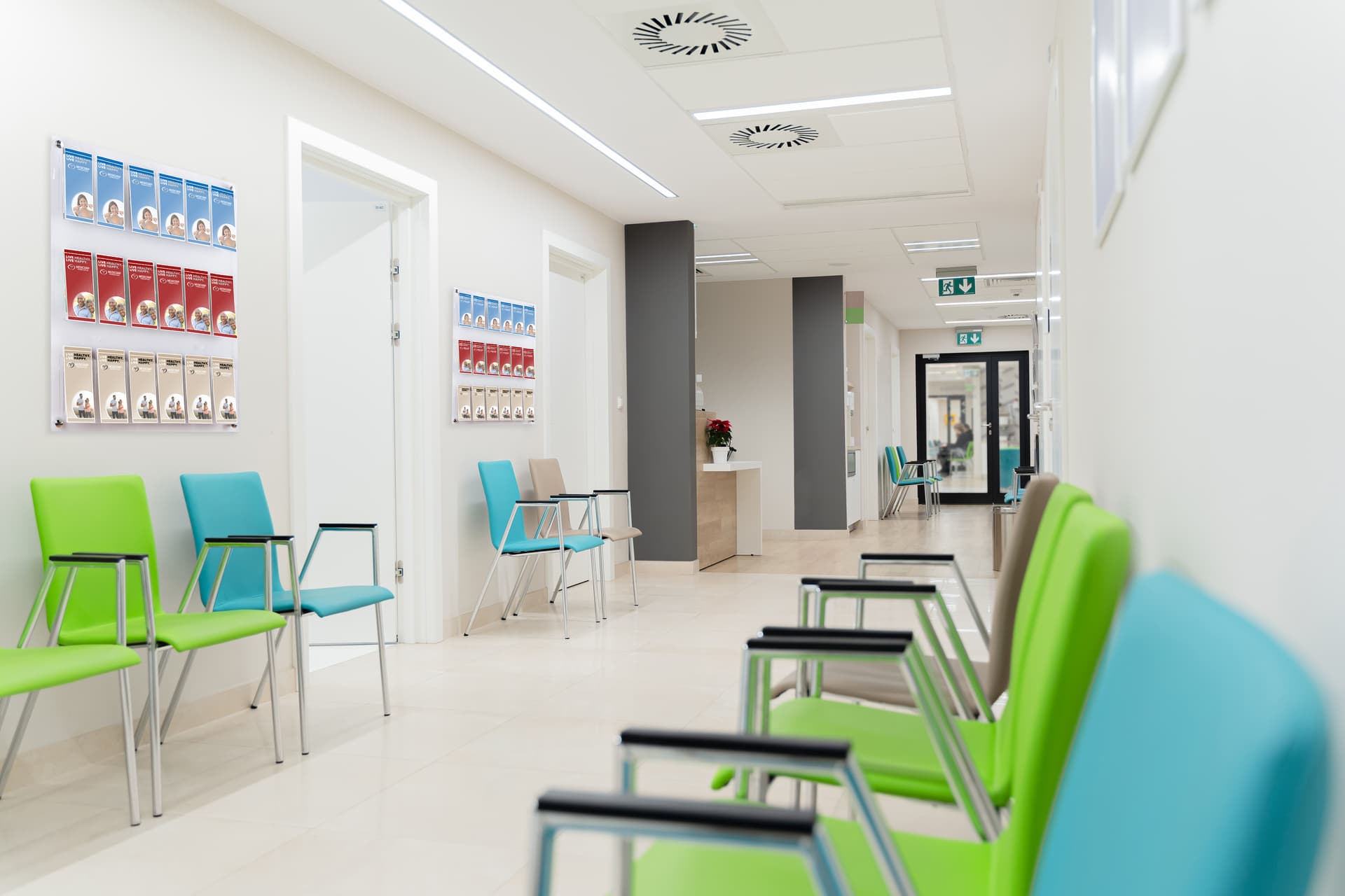 3-tiered acrylic literature wall rack in medical facility 