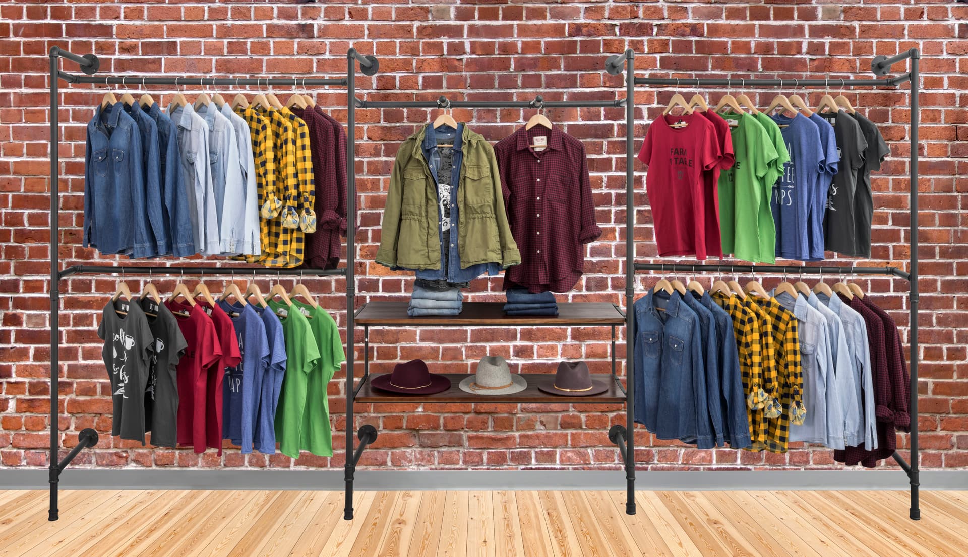 Pipe Outrigger Retail Wall System Showcasing Clothing on Brick Background