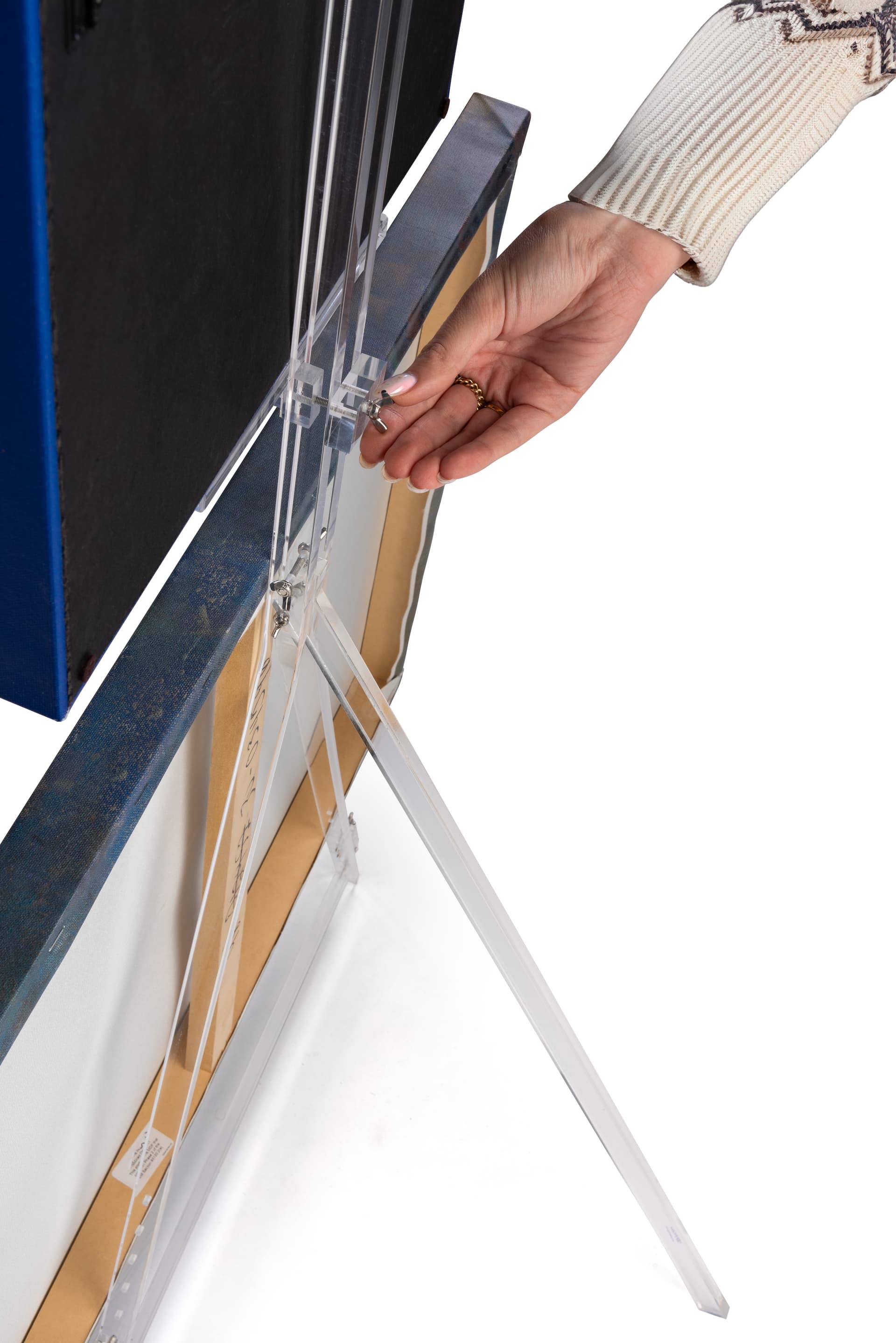 Acrylic tripod easel is height adjustable