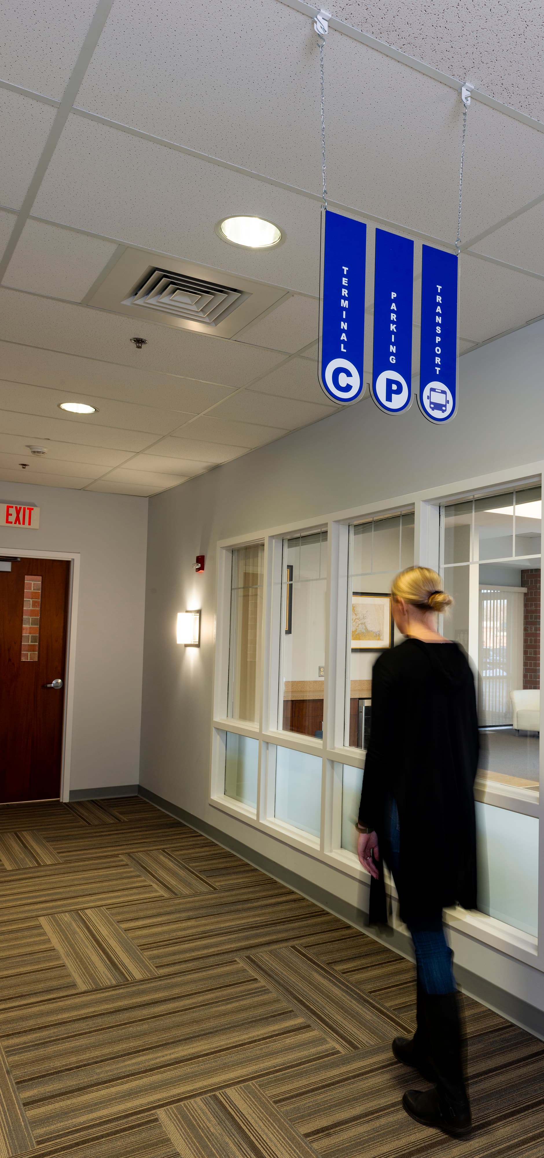 Ceiling hanging directional signage with vivid graphics