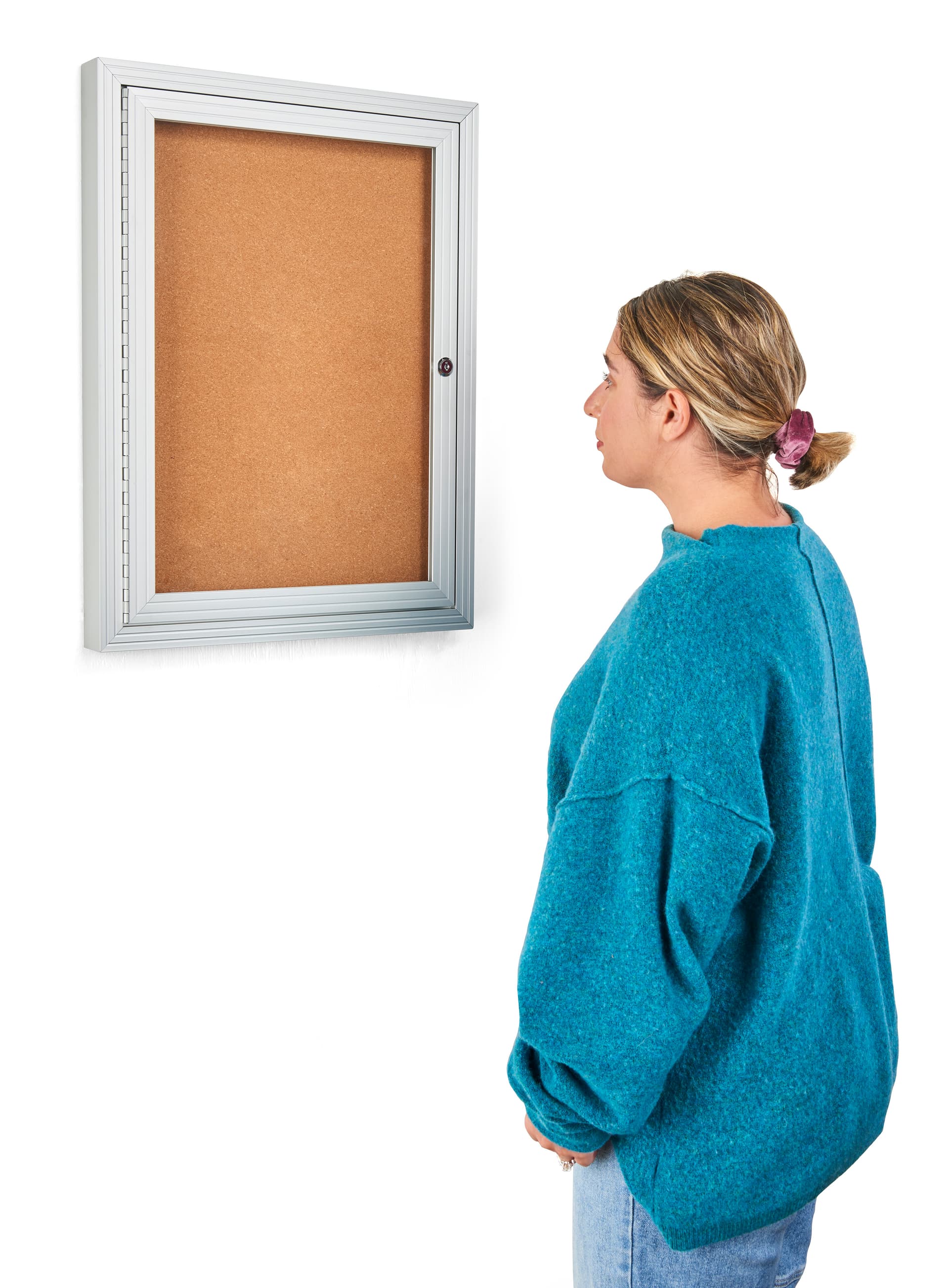 This enclosed aluminum bulletin board has a locking door
