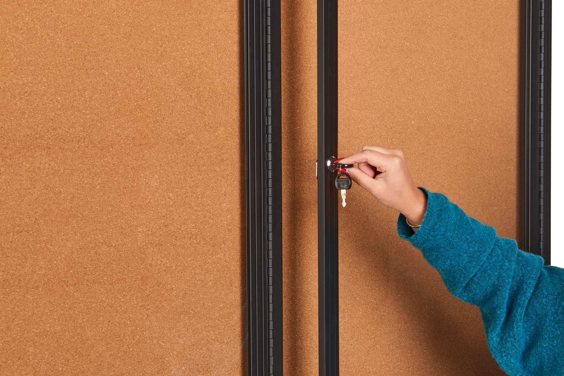This 72 x 36 locking bulletin board has keys included