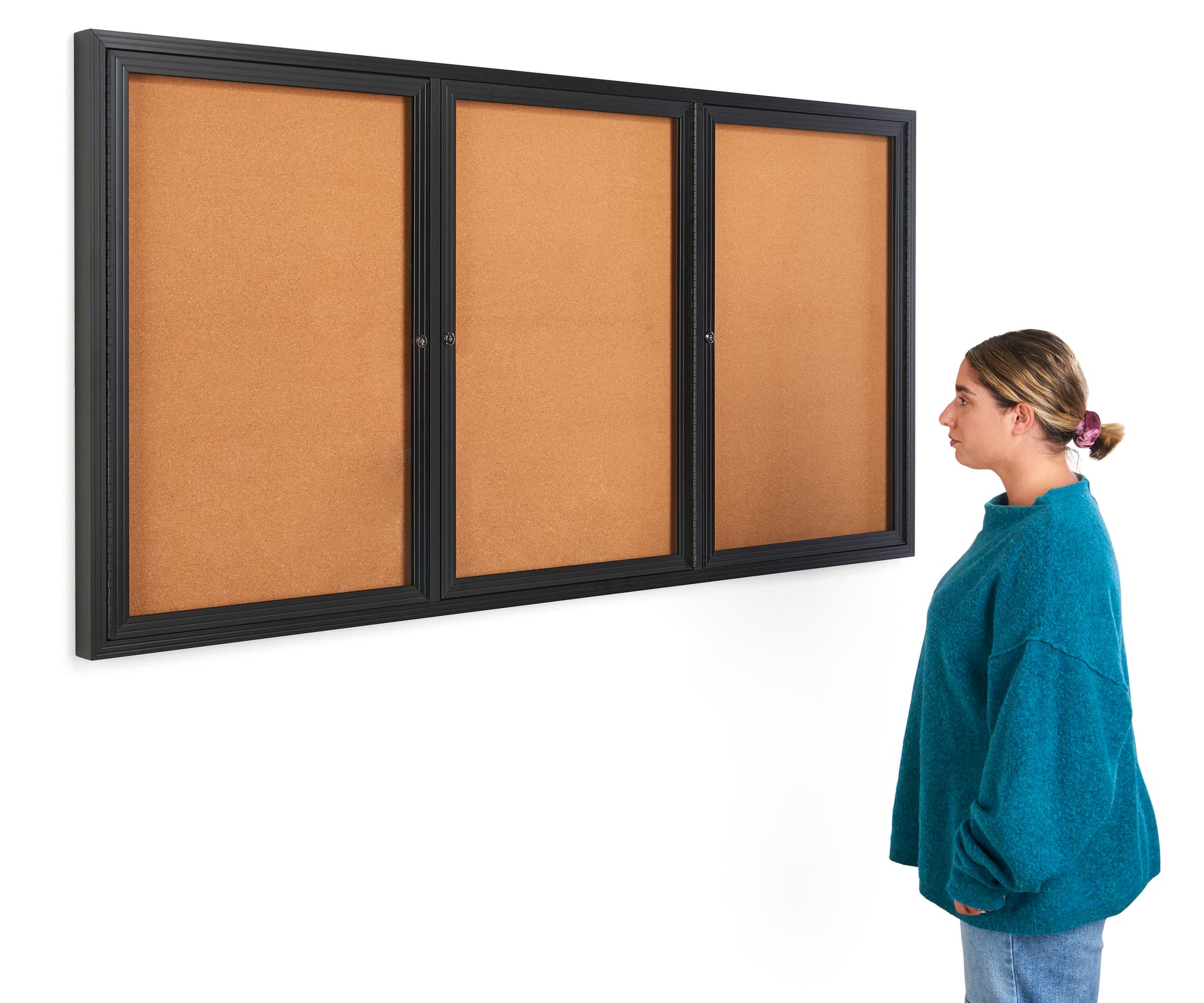 This 72 x 36 locking bulletin board features mitered corners