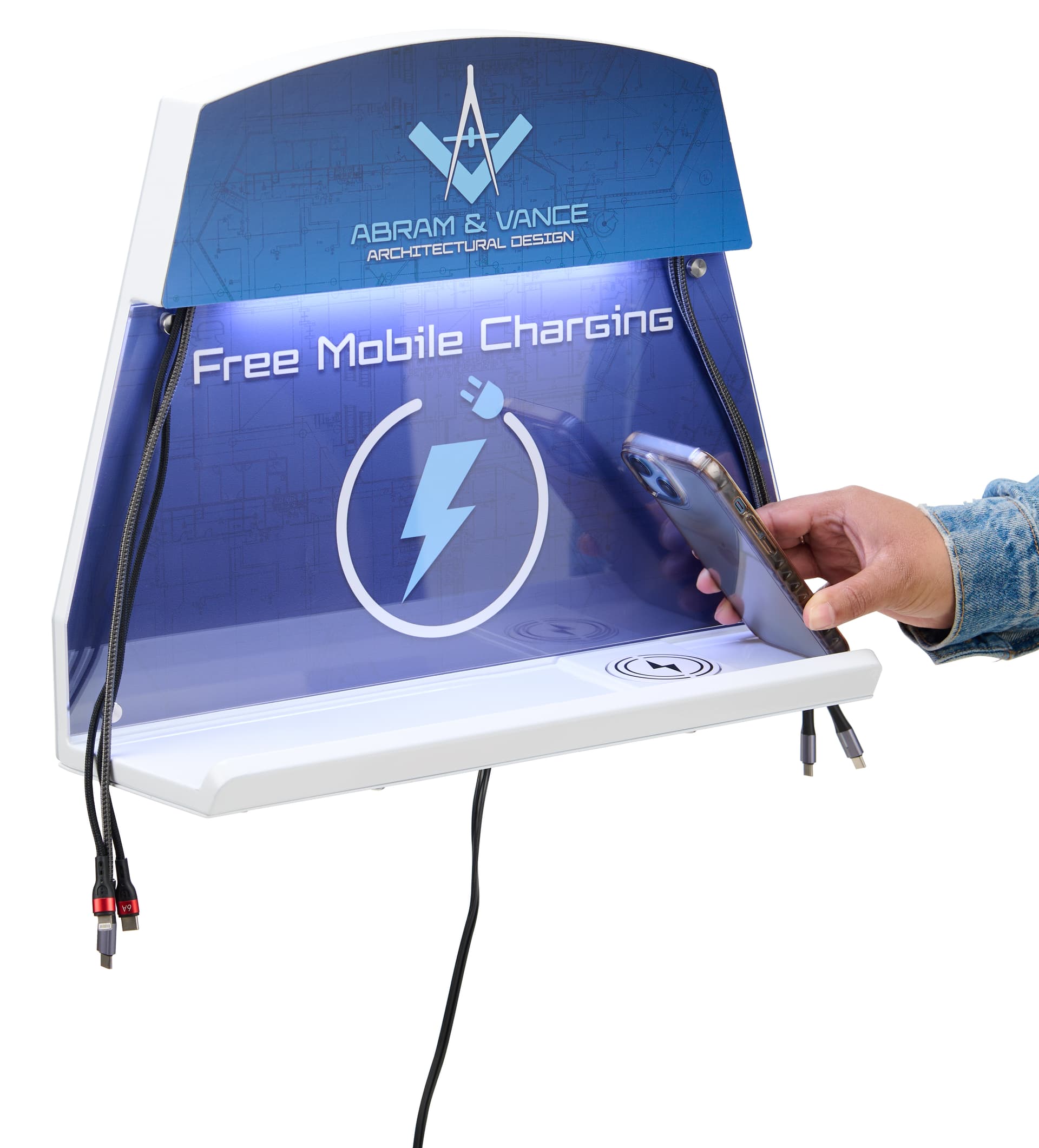 Cell phone charging station with phone being placed on wireless charging pad