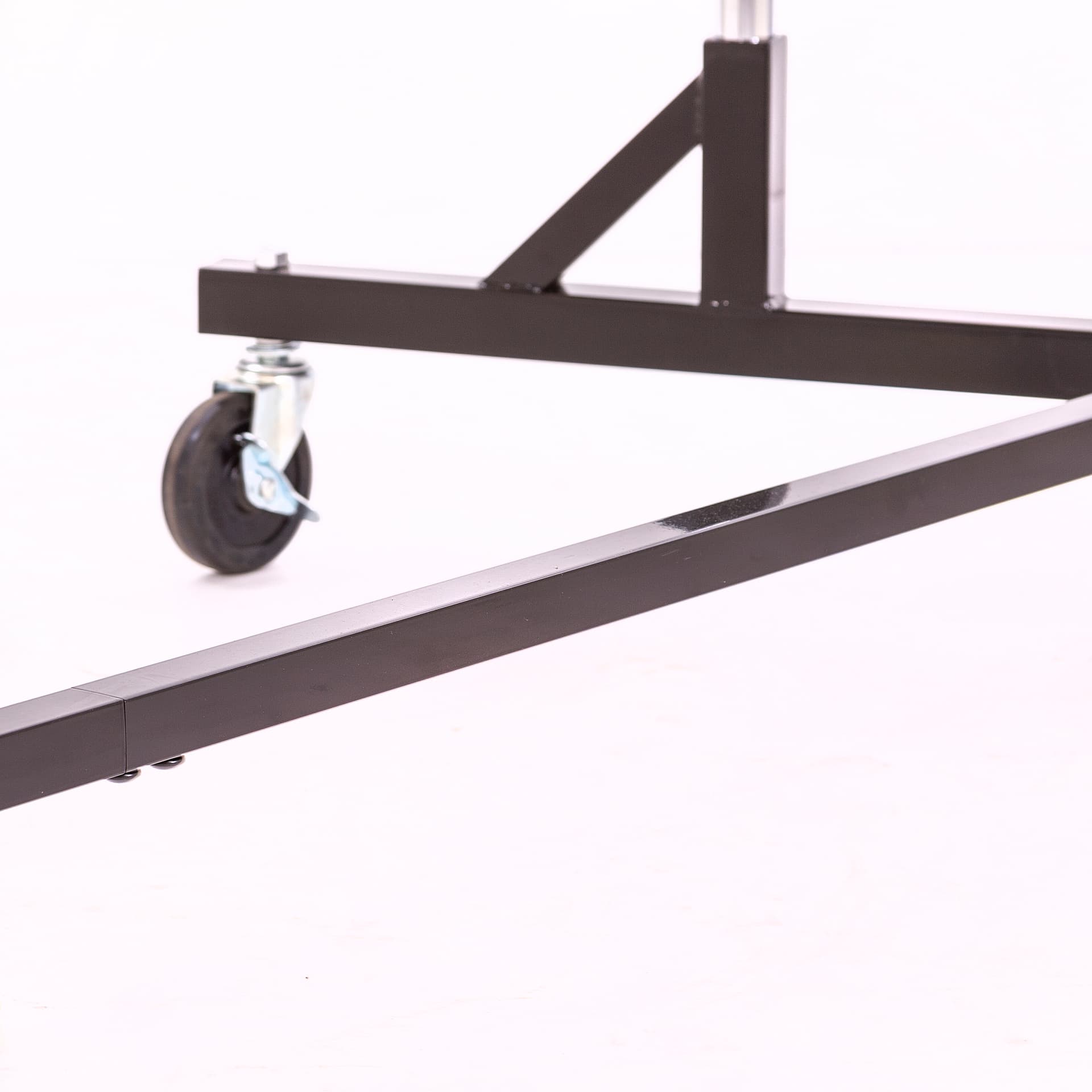 Z garment rack with a z shaped base for space saving and sturdy construction