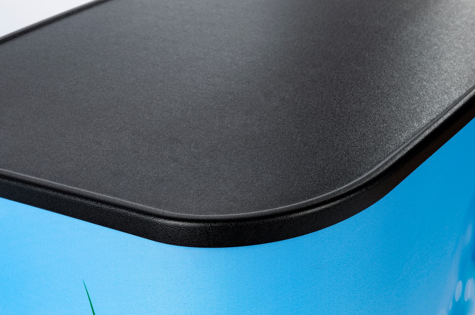 Textured black surface on top of air inflatable backlit rectangular counter