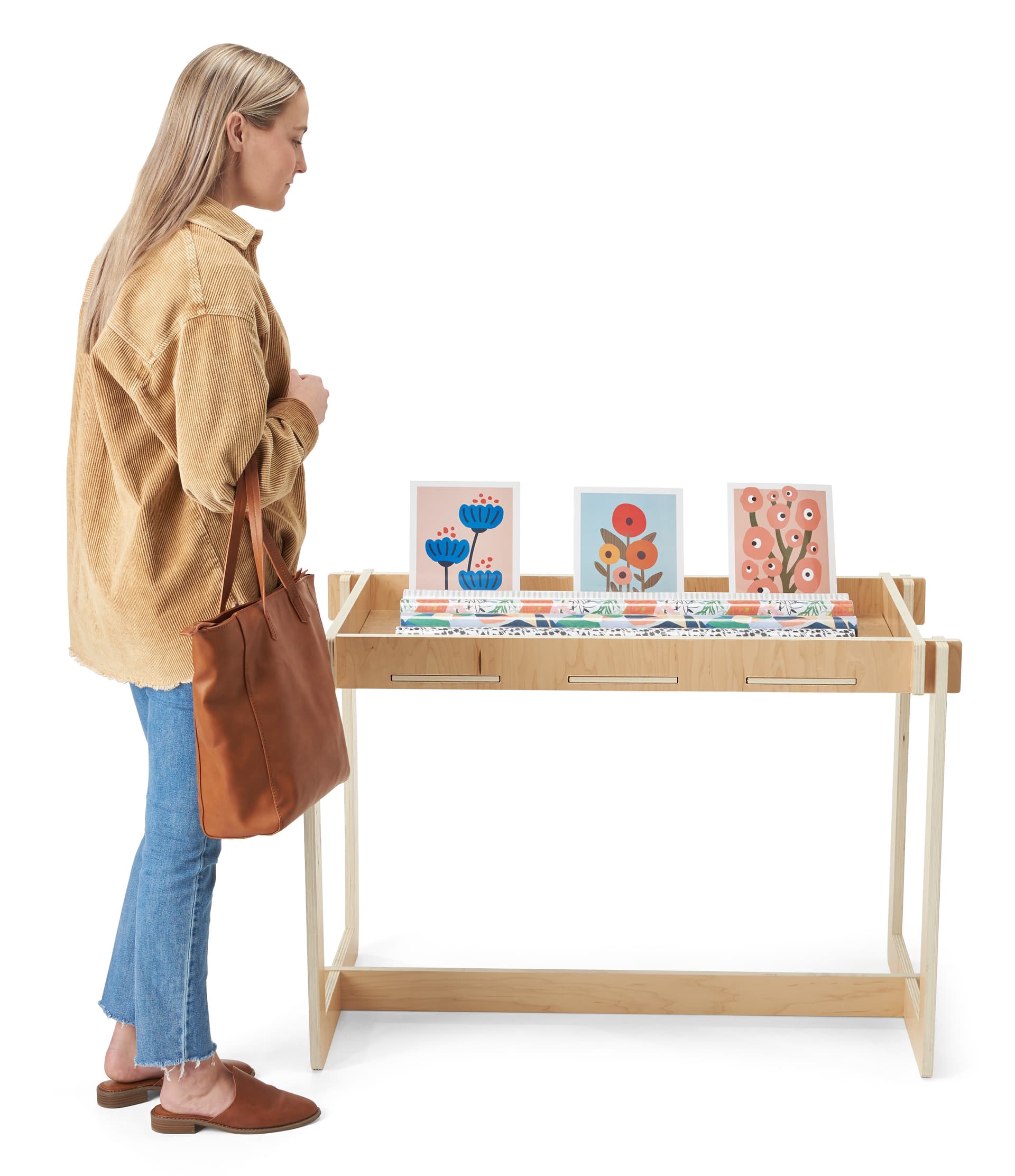 Wooden retail dump table stands 30 inches tall and has a width of 44 inches