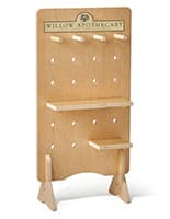 Pegboard retail display with custom printed header 