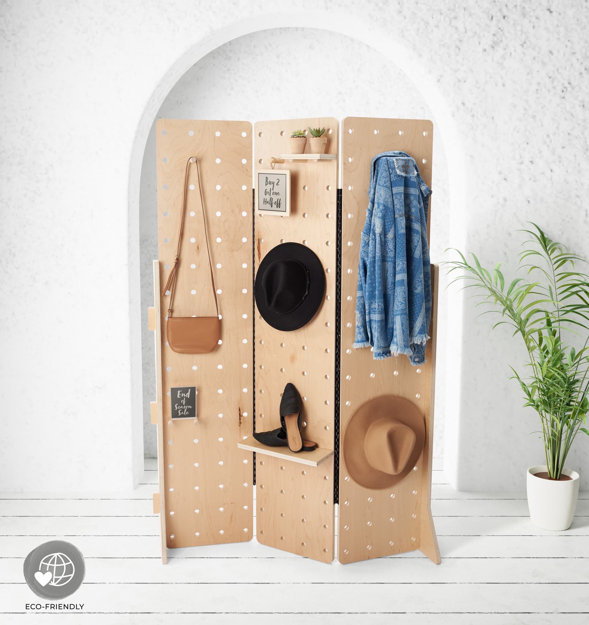 Folding pegboard display with contemporary and essential arrangement
