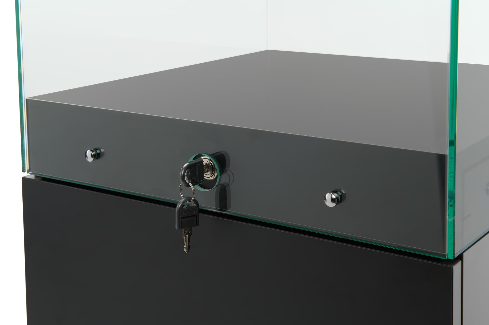 Glass-top pedestal display case with two keys