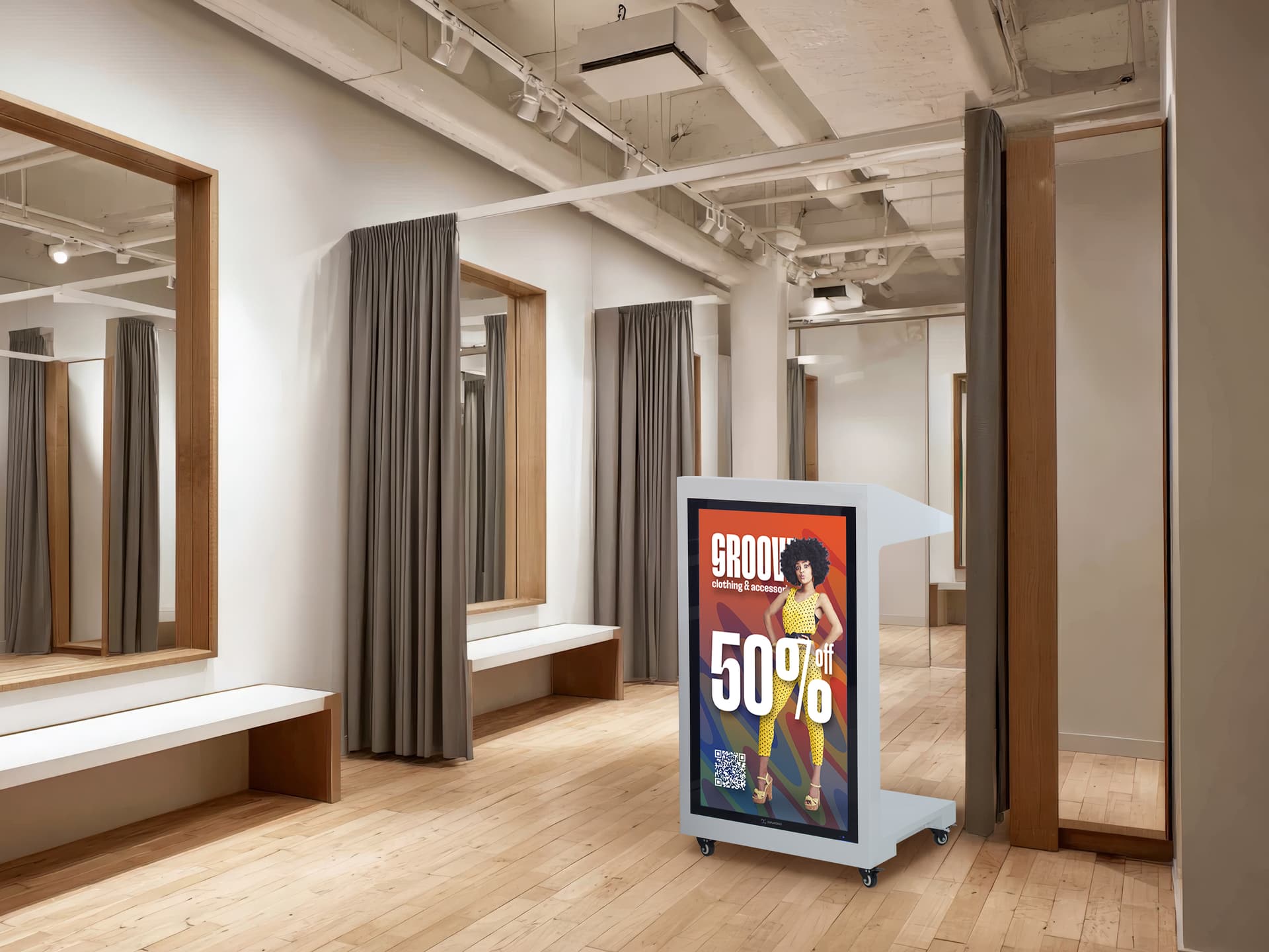 Checkout stand with digital display sold being showcased in a retail fitting room space