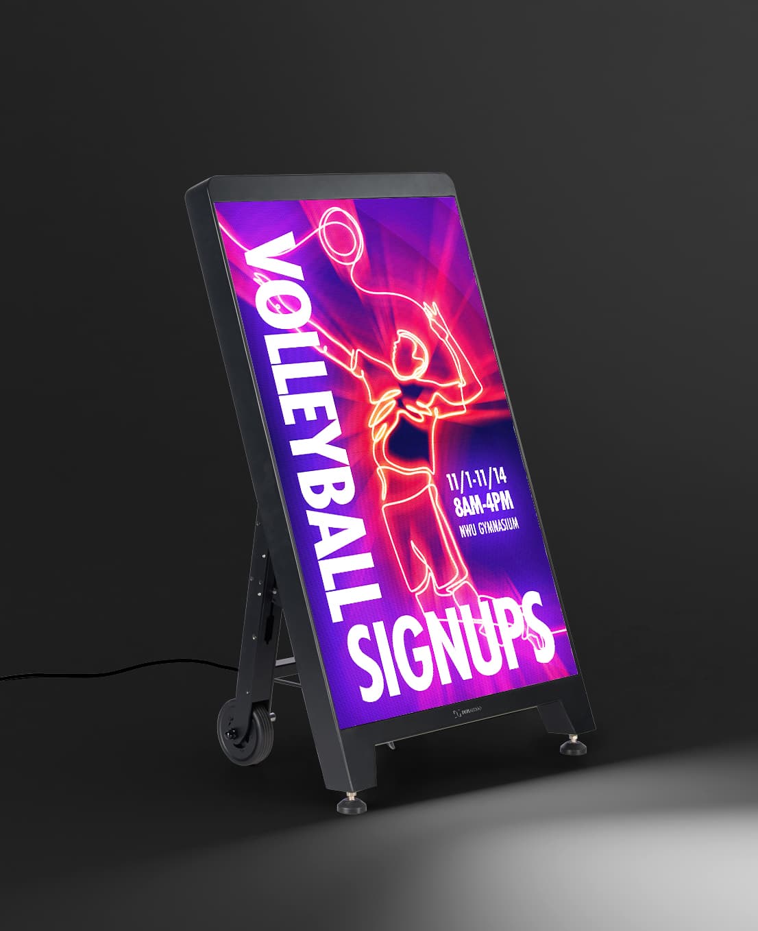 Digital sidewalk sign with volleyball graphic being showcased in a dark room