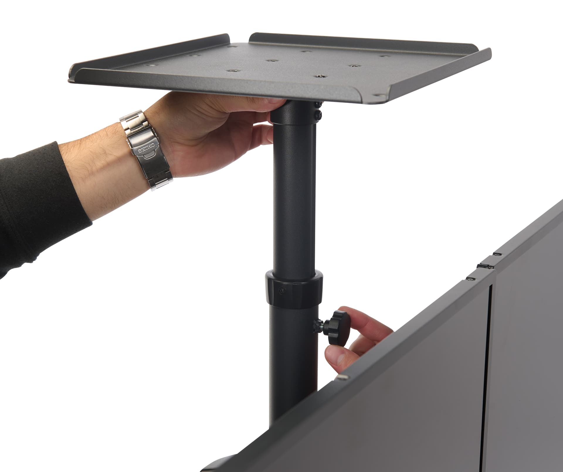 Motorized double screen floor standing with adjustable media player platform located on top of the unit