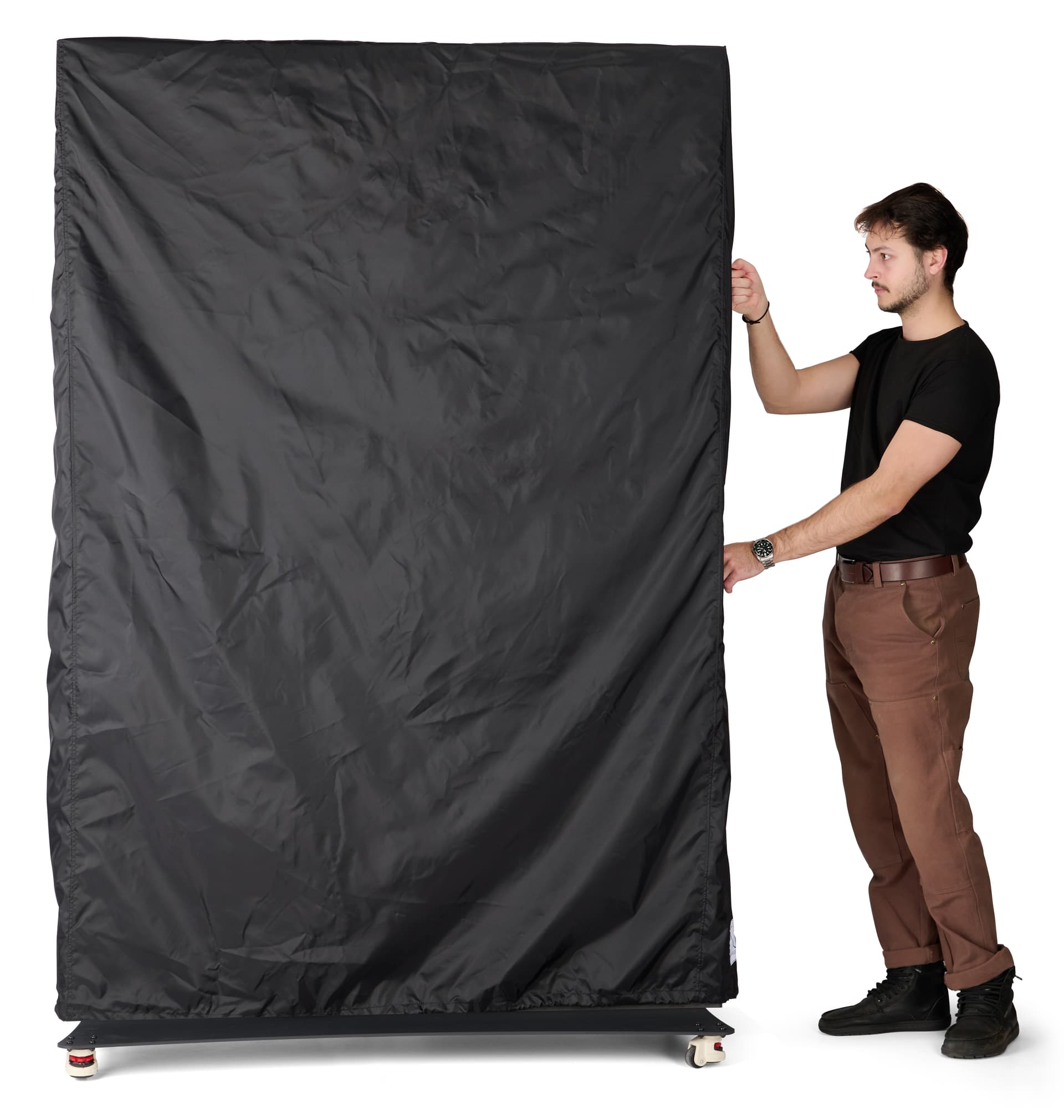 Dust cover for DF080NVB LED poster being put on the 80 inch by 50 inch LED poster