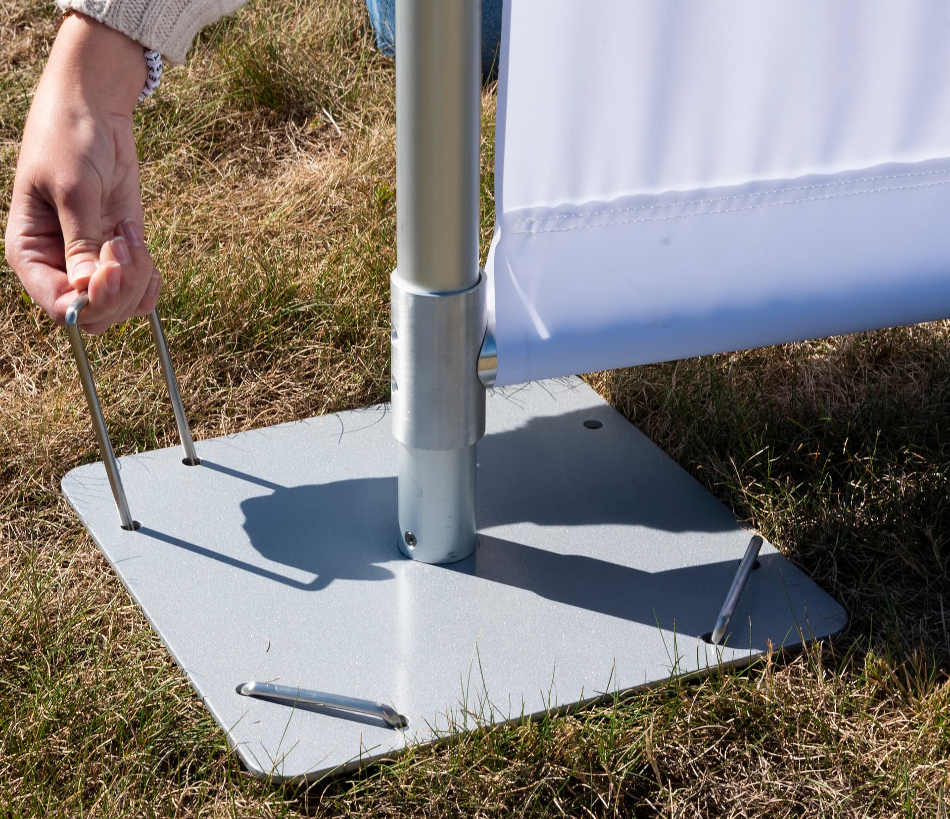 Custom outdoor banner stand with ground stakes