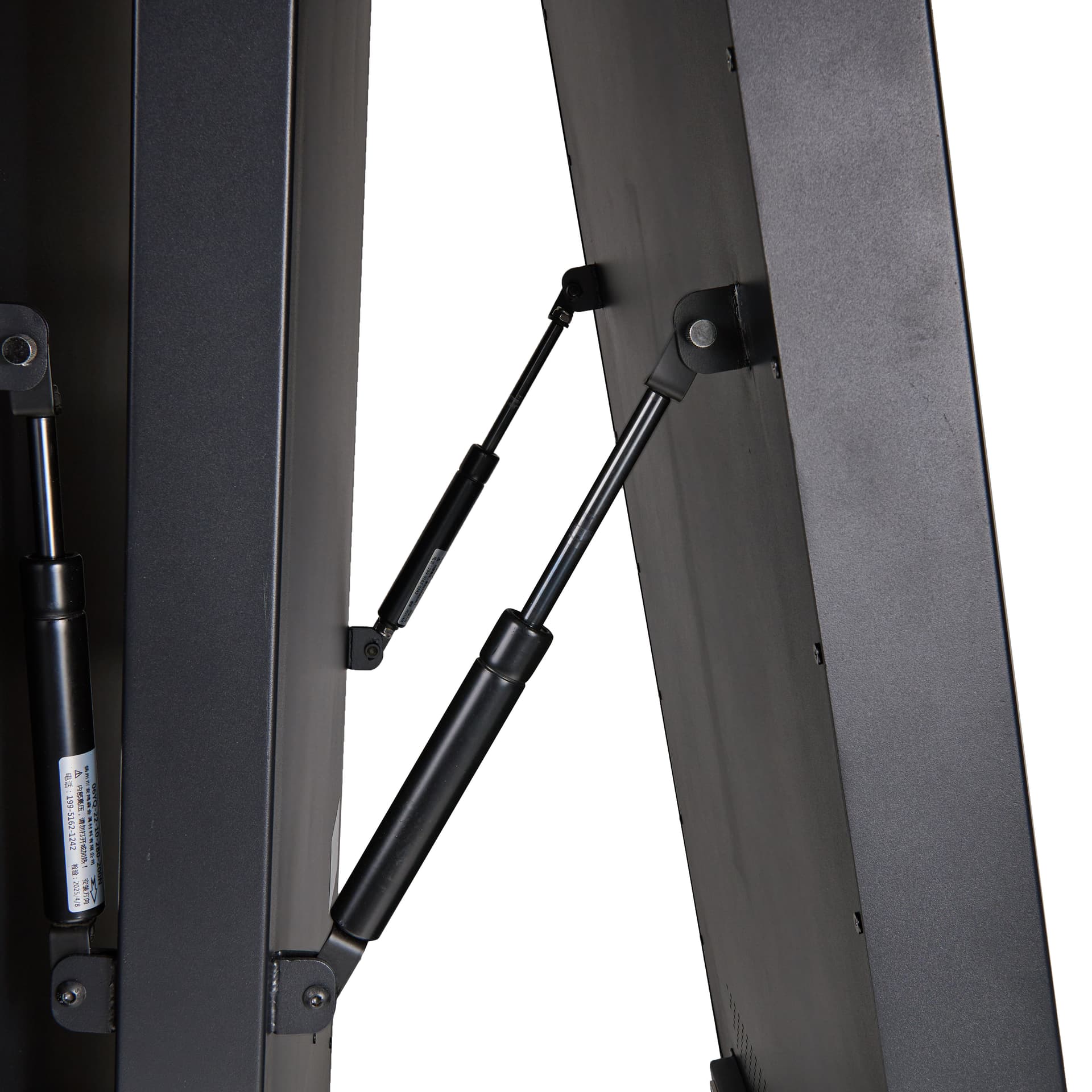 Outdoor LED display with gas struts on both sides when the unit is unfolded and ready to deploy