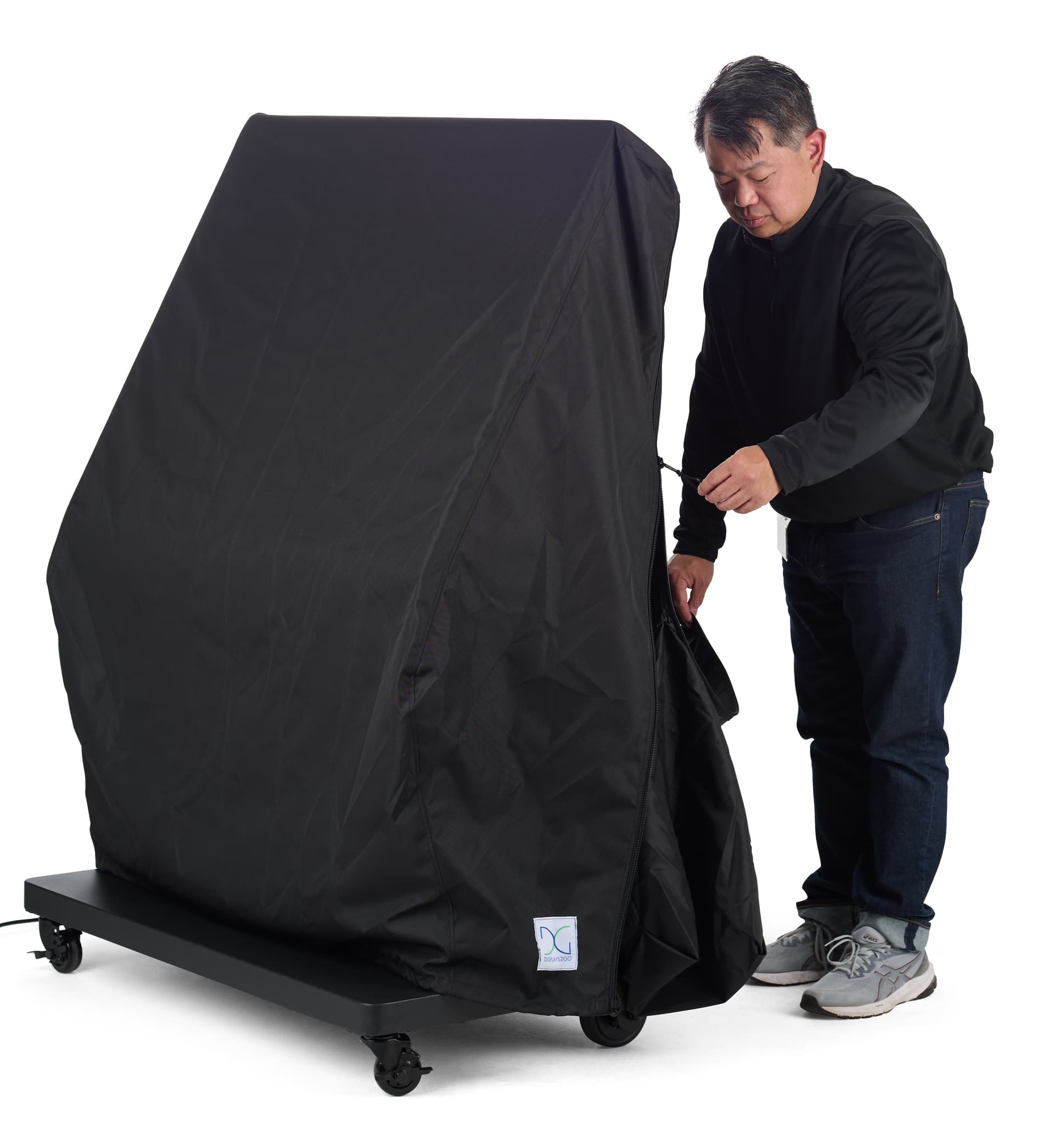 Outdoor touch screen display with the included cover being placed and zipped over the unit