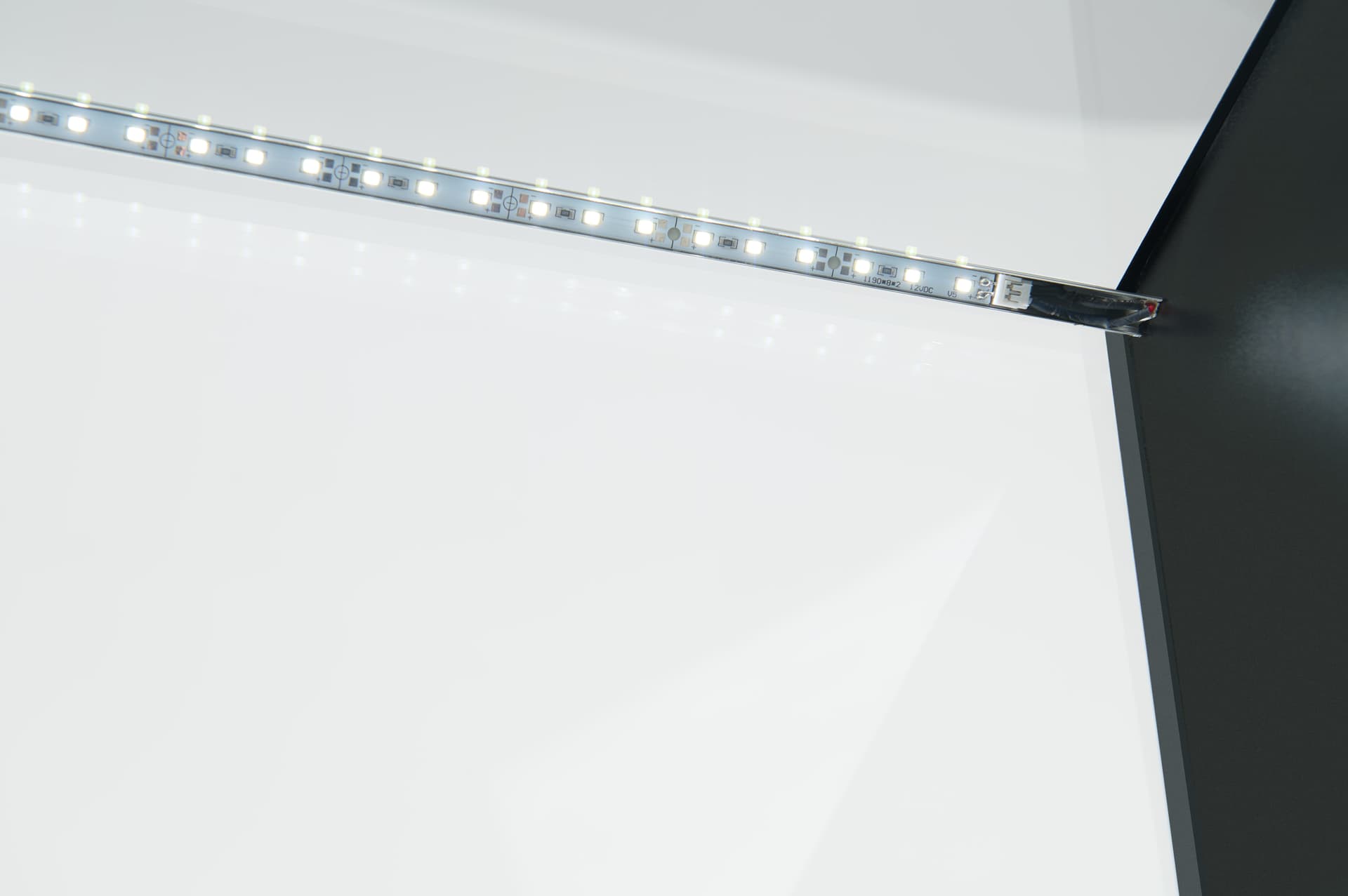 Glass showcase counter with cool white interior LED lighting
