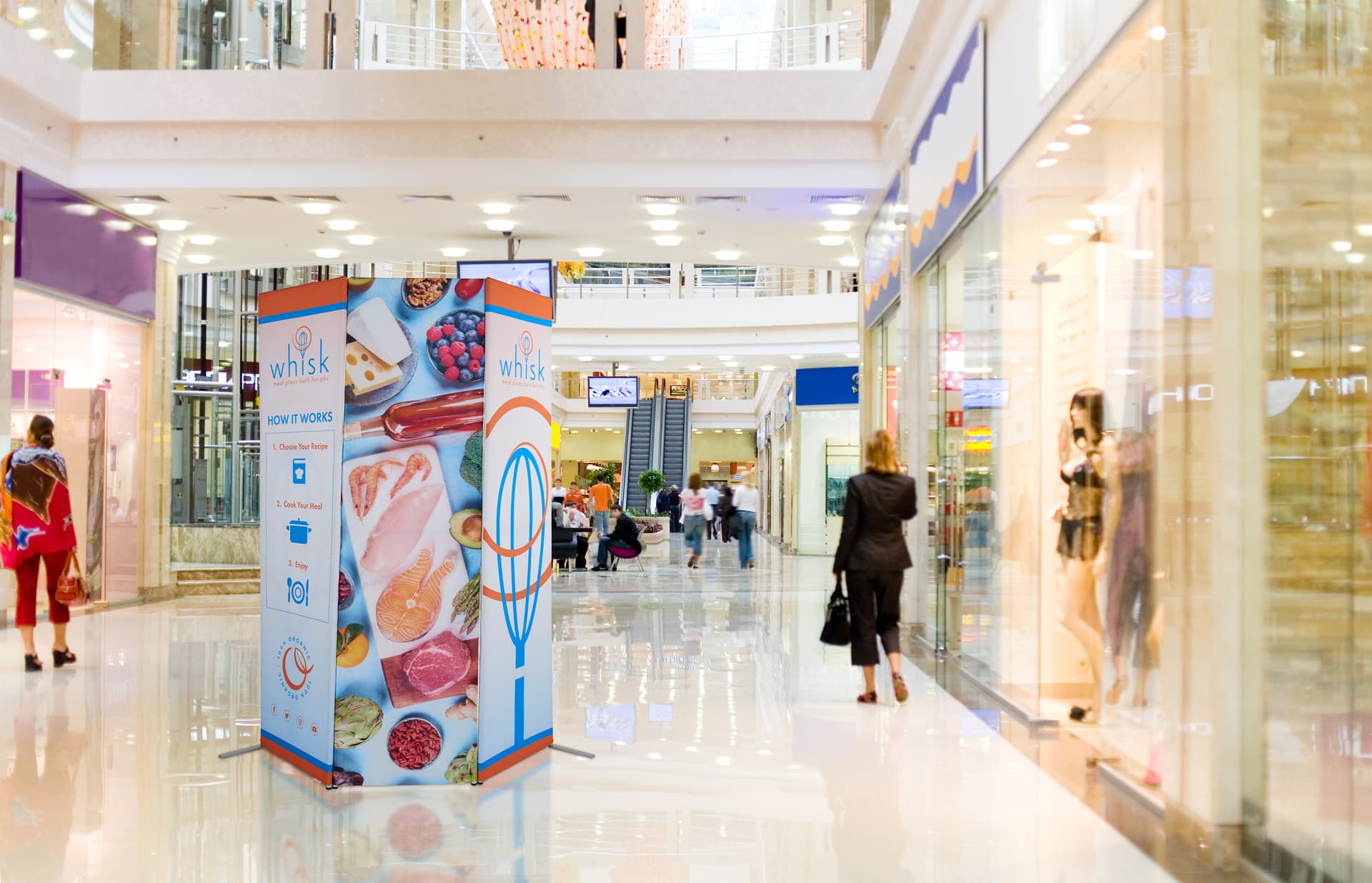 Fabric banner display stand with tight fitting graphics