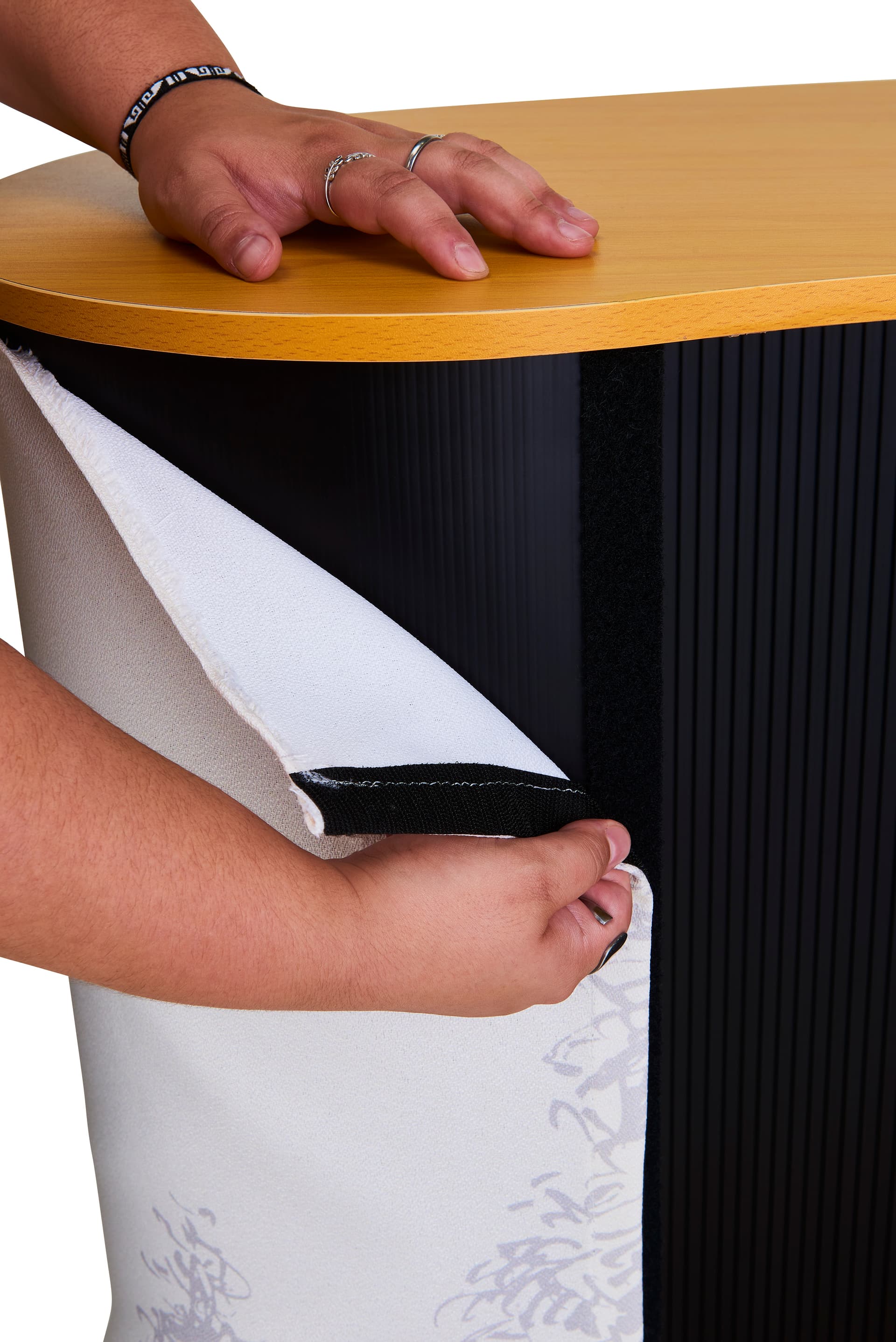 Portable trade show counter with simple hook-and-loop attachment