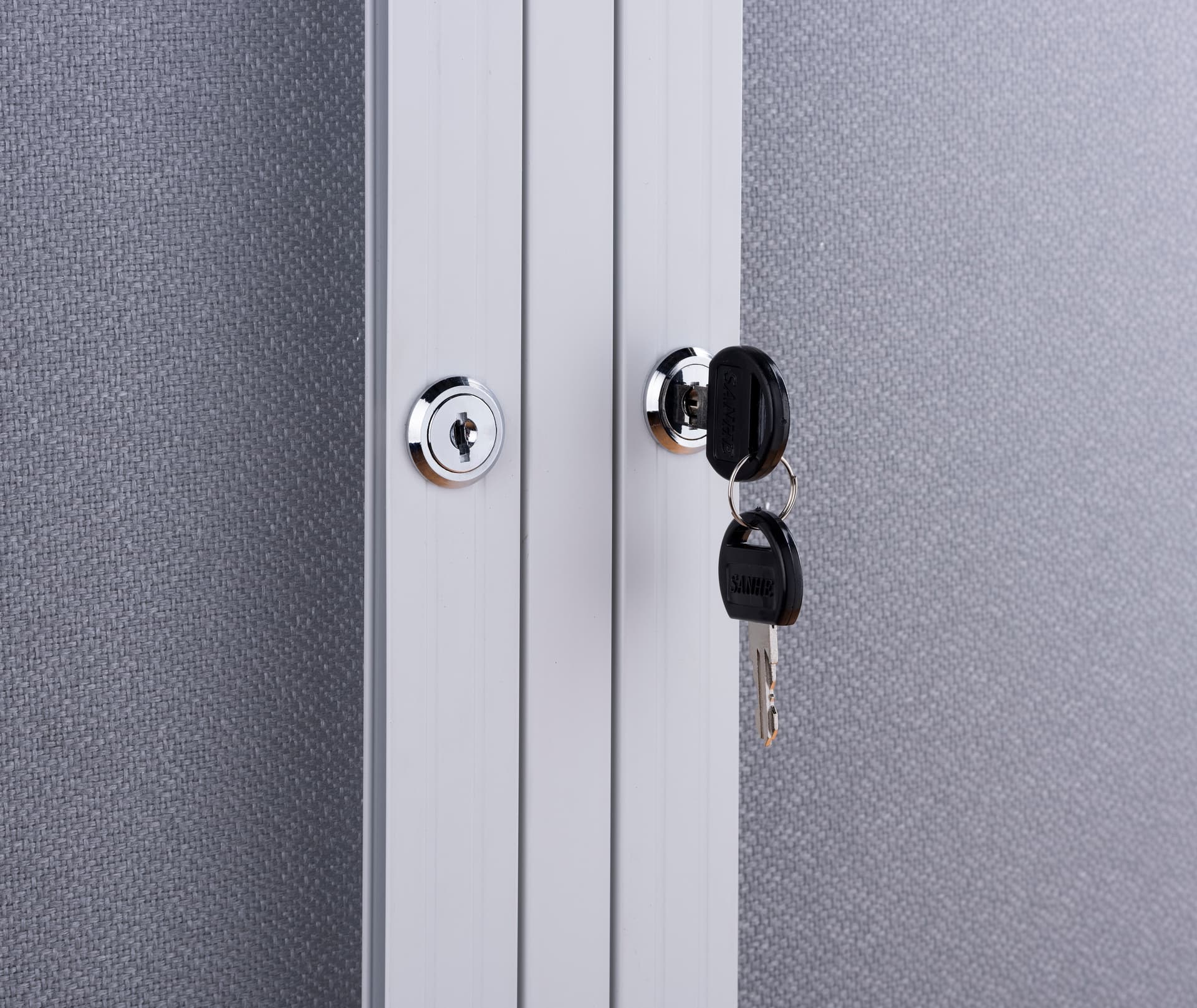 Indoor enclosed bulletin board cabinet with set of two keys