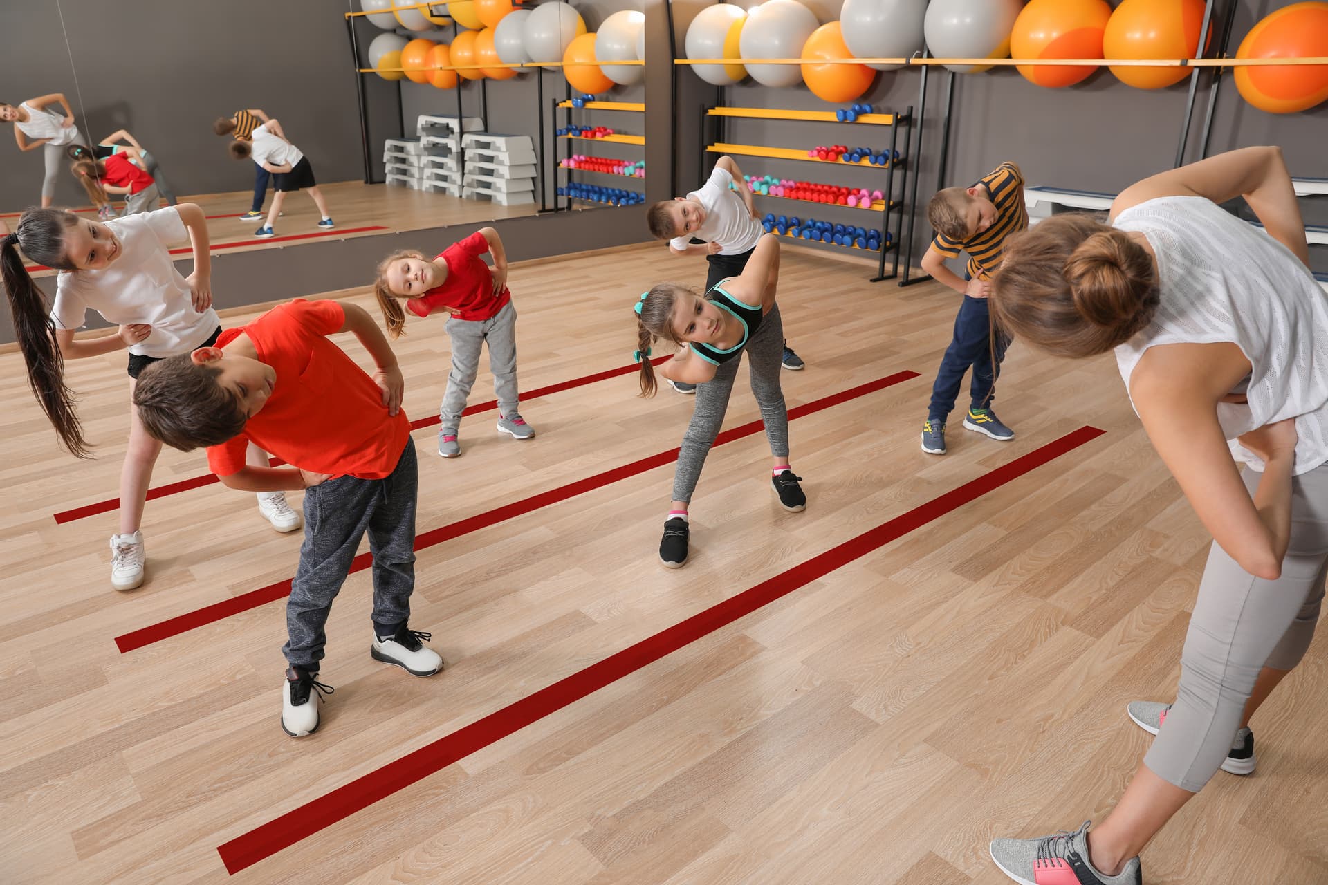 Red vinyl floor tape marking rows