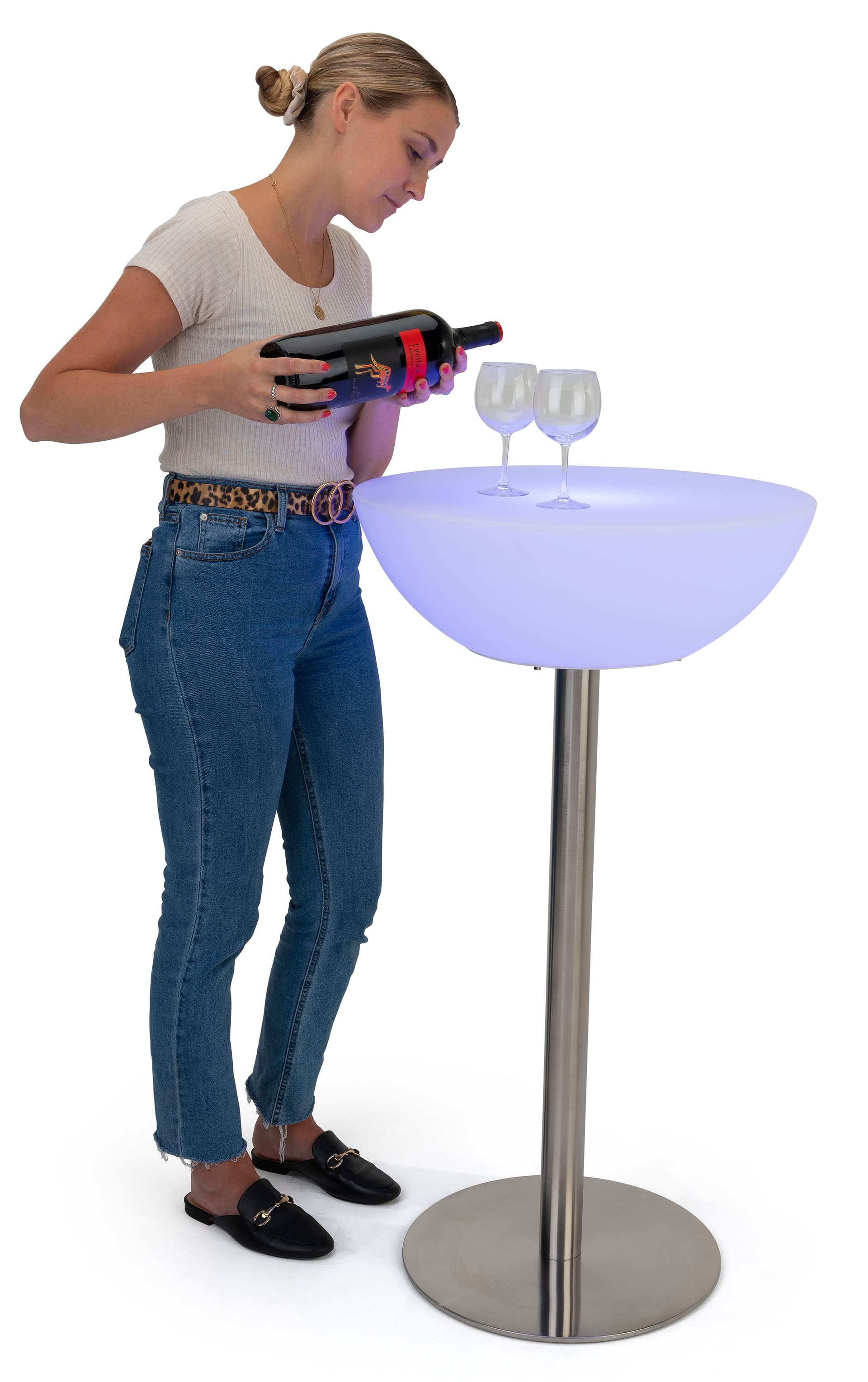 Woman serving wine on a half-moon LED cocktail table