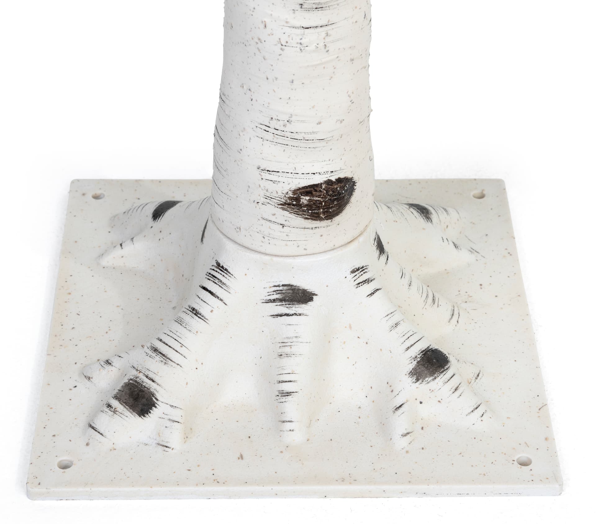 Lighted birch tree with stake holes in base