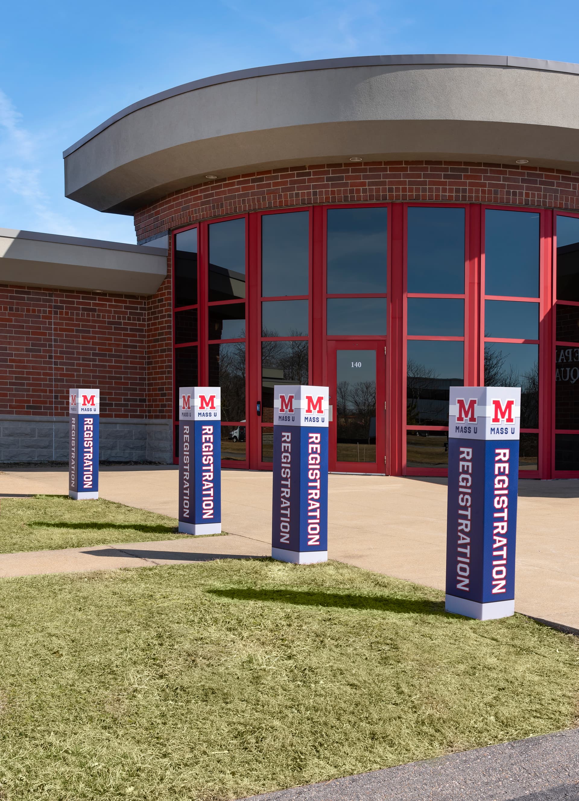 Square advertising bollard sign has durable construction for outdoor use