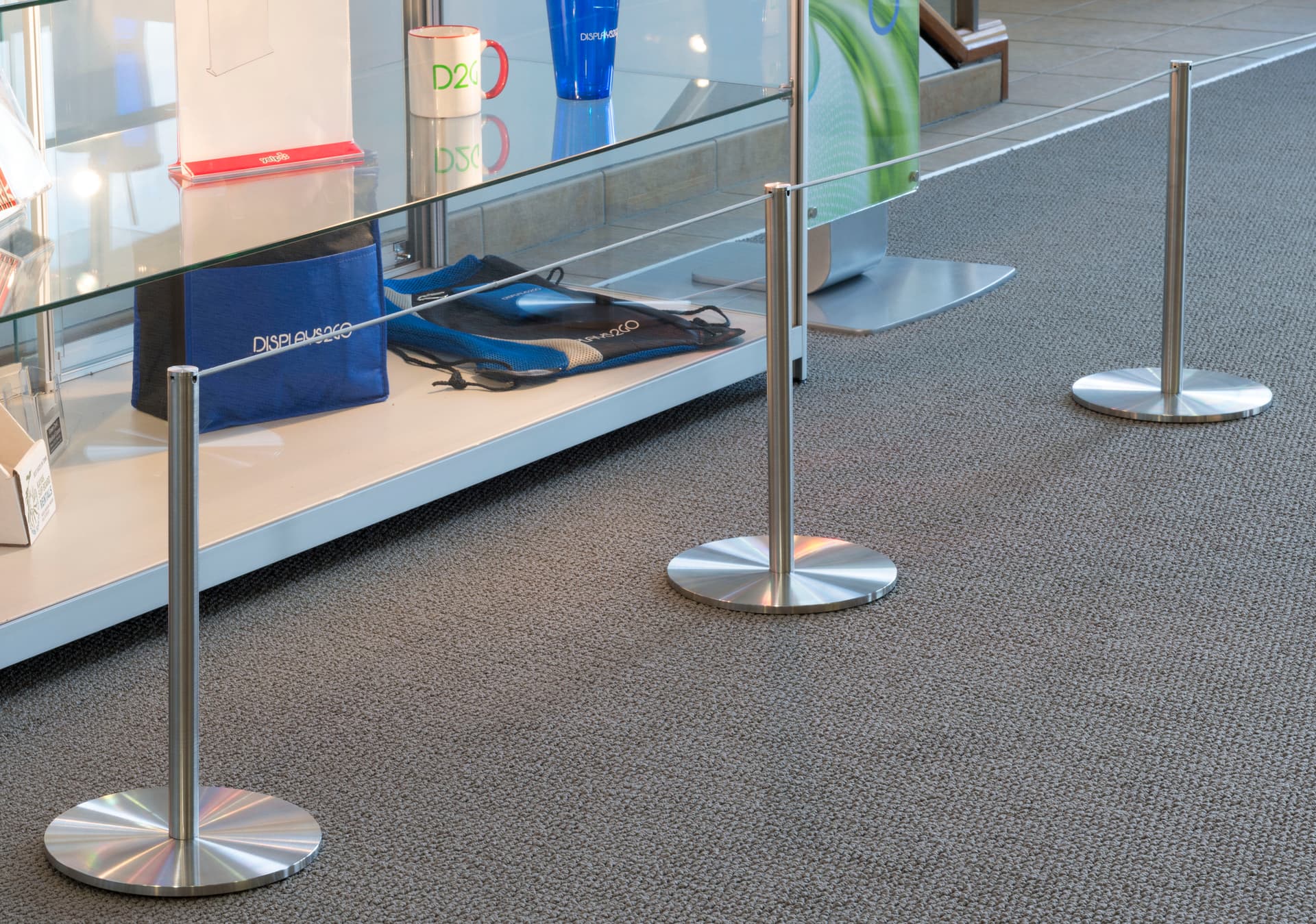 50-ft Gray Elastic Barrier Cord Attached to 3 Low Profile Stanchions