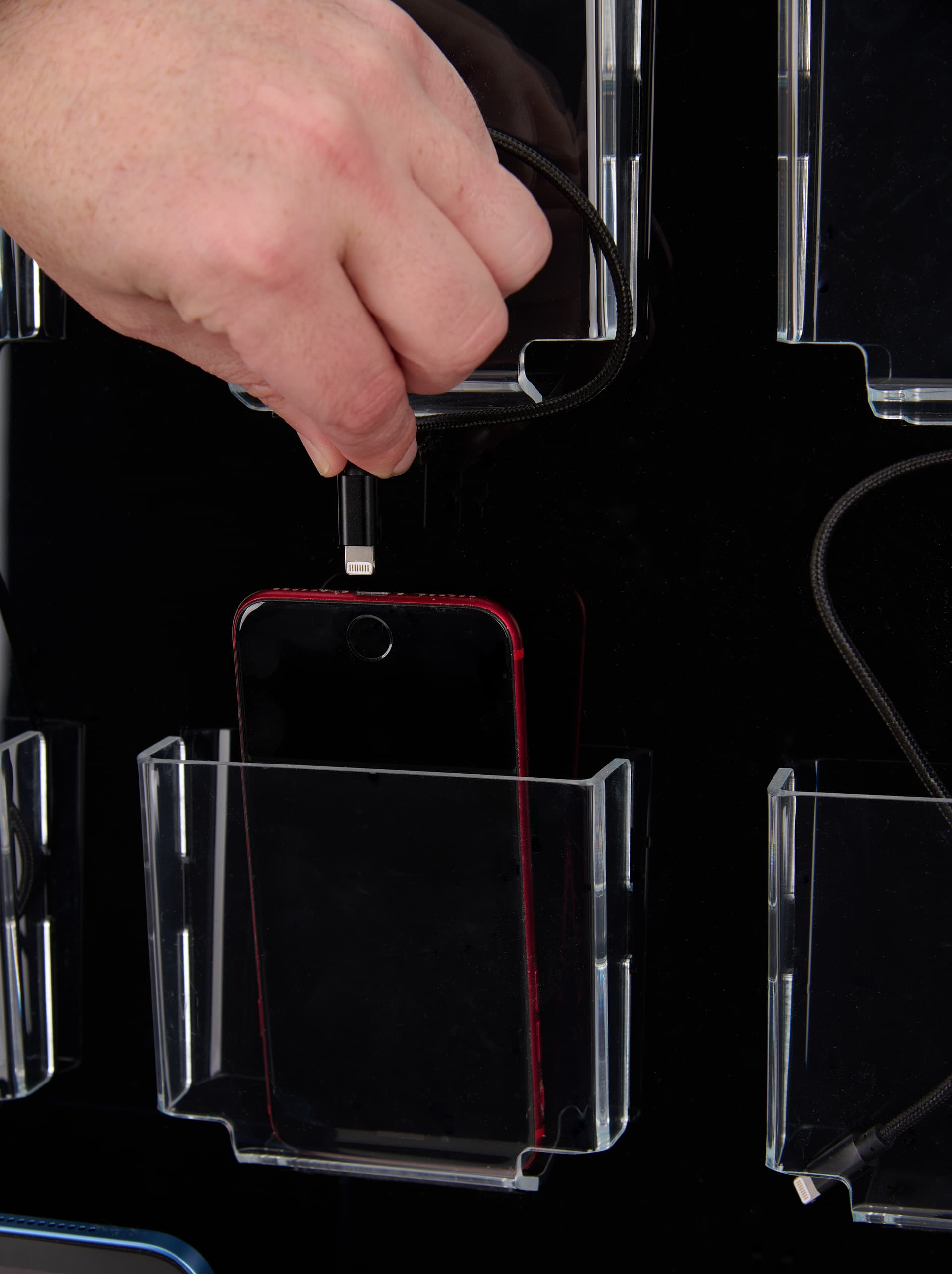 Public charging kiosk with 4 lightning cables