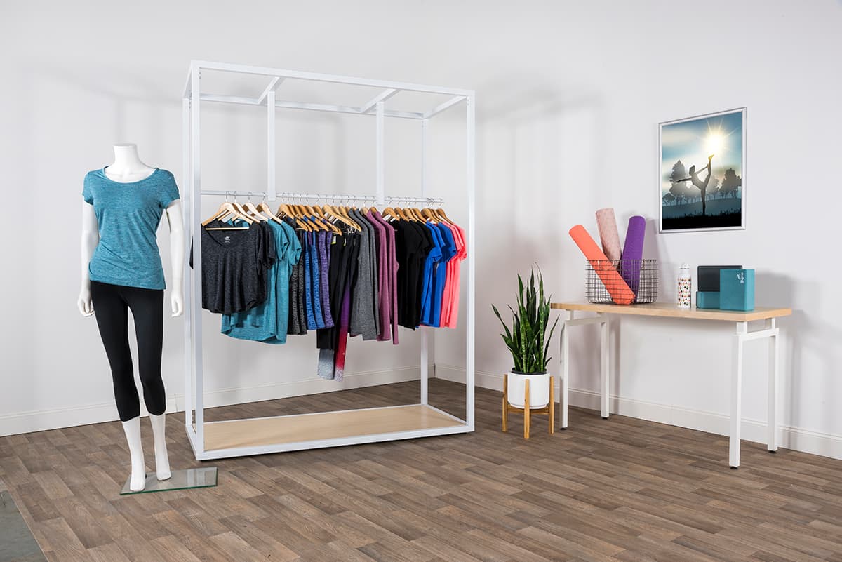 Boutique floor clothing hanger display with MDF base