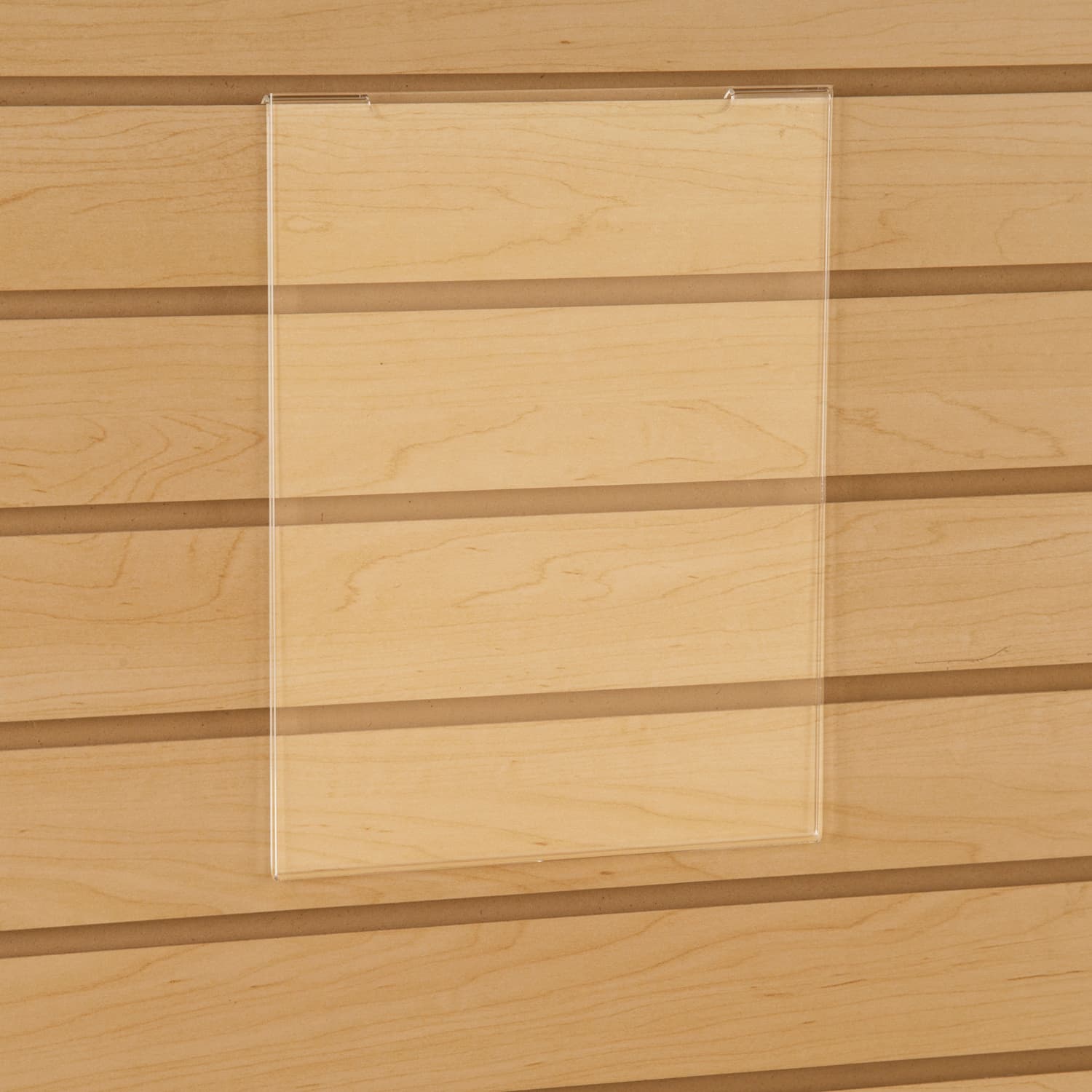 Acrylic gridwall sign holder being shown on a slatwall 