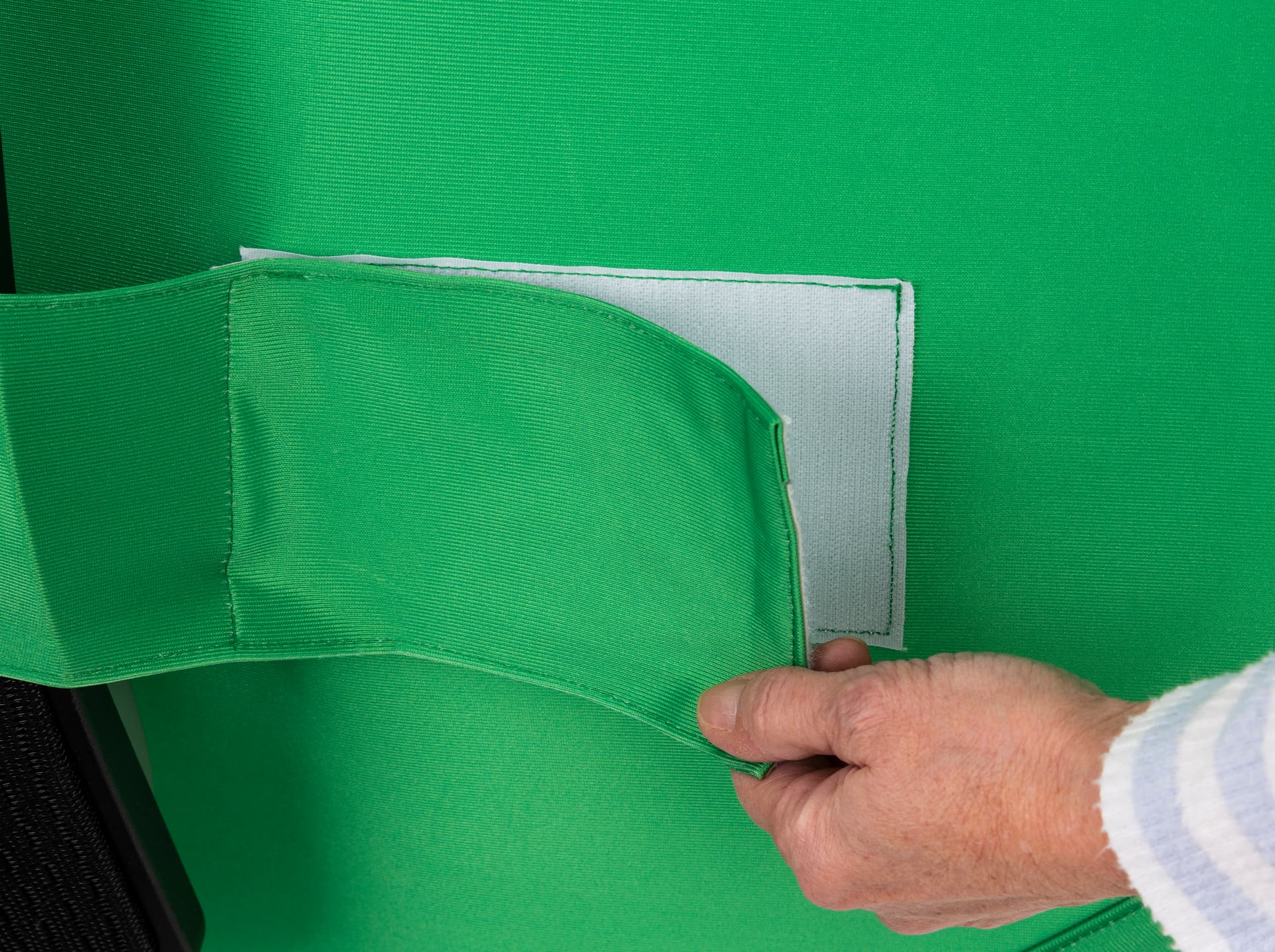 Portable chair mounted green screen with hook & loop closure attachments