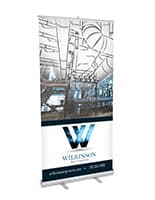 Budget narrow base retractable banner stand with floor standing placement