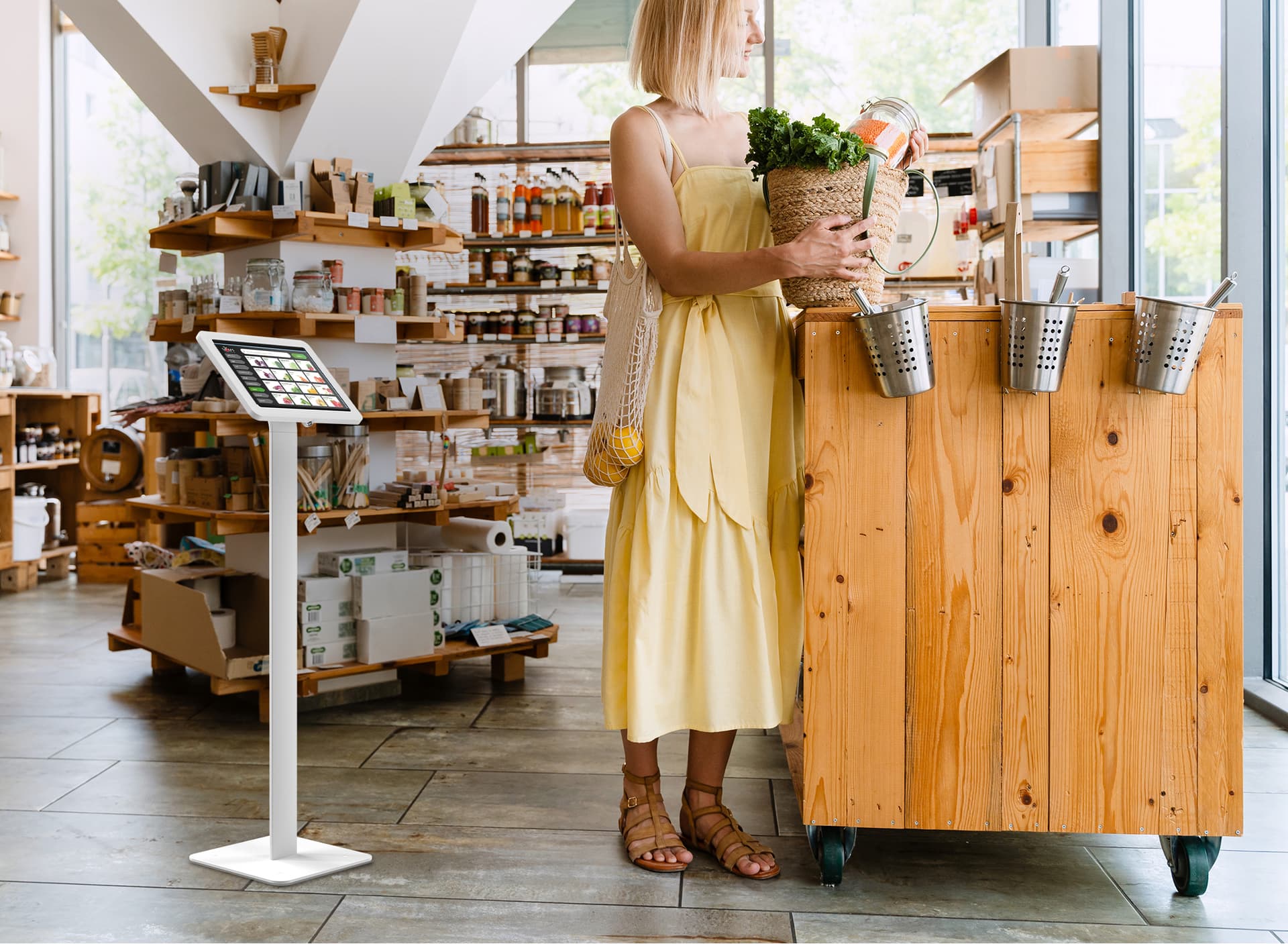 Floor standing Microsoft Surface tablet holder being utilized as POS system in a small health food store