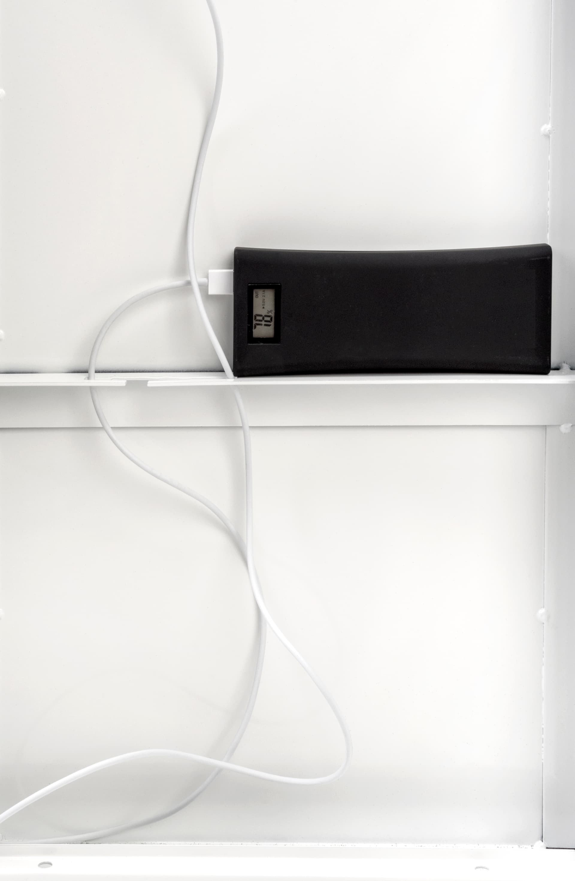 White iPad floor stand kiosk with interior shelf for power bank or power strip