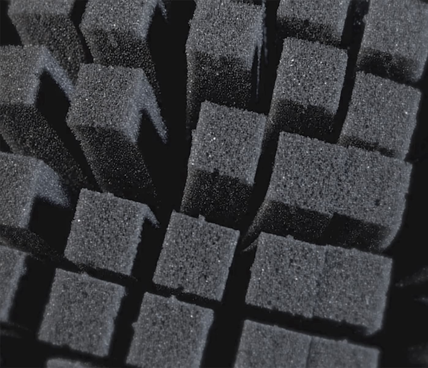Charcoal colored small block pre-scored cubed foam sheets