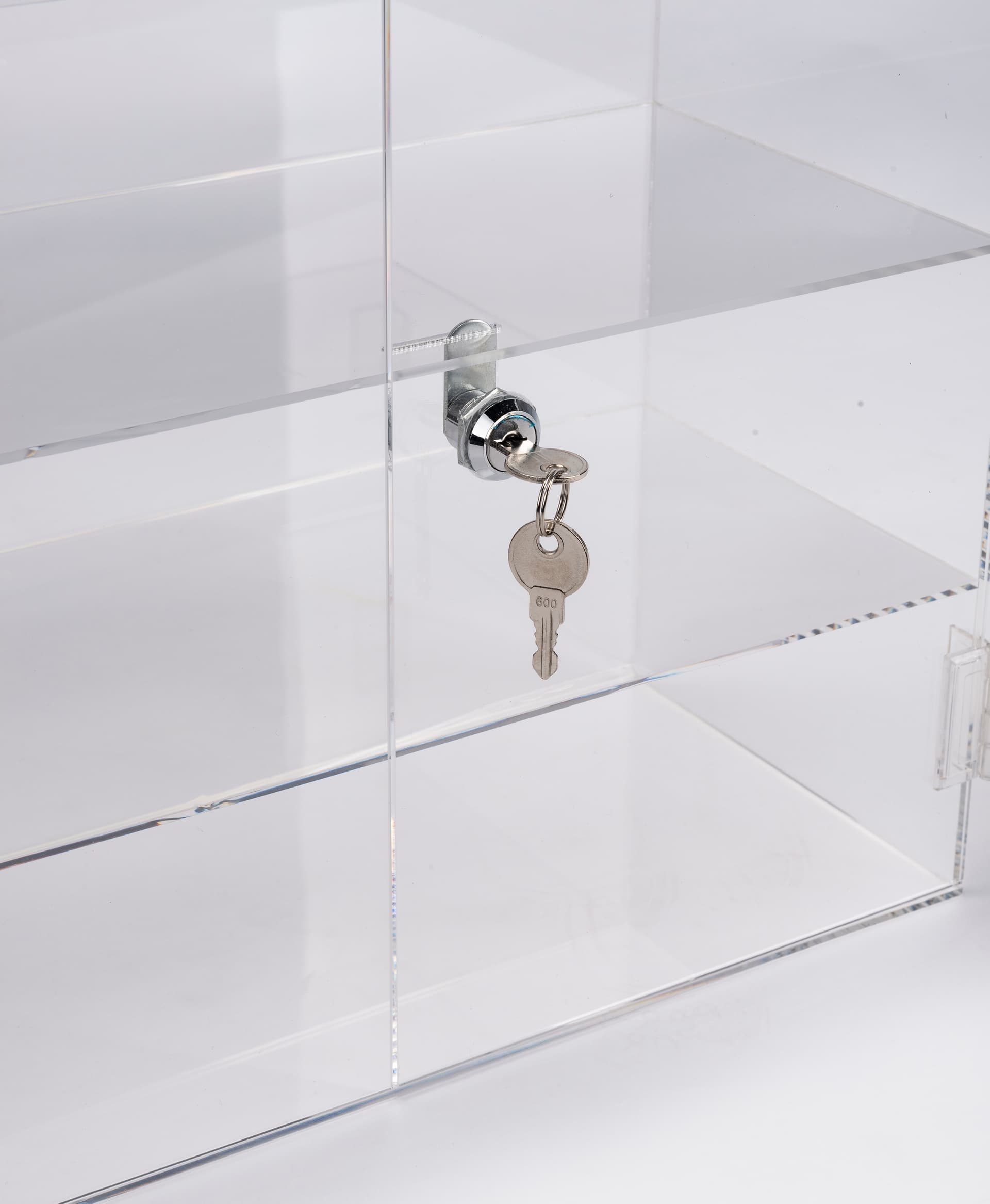 Acrylic display case includes two keys