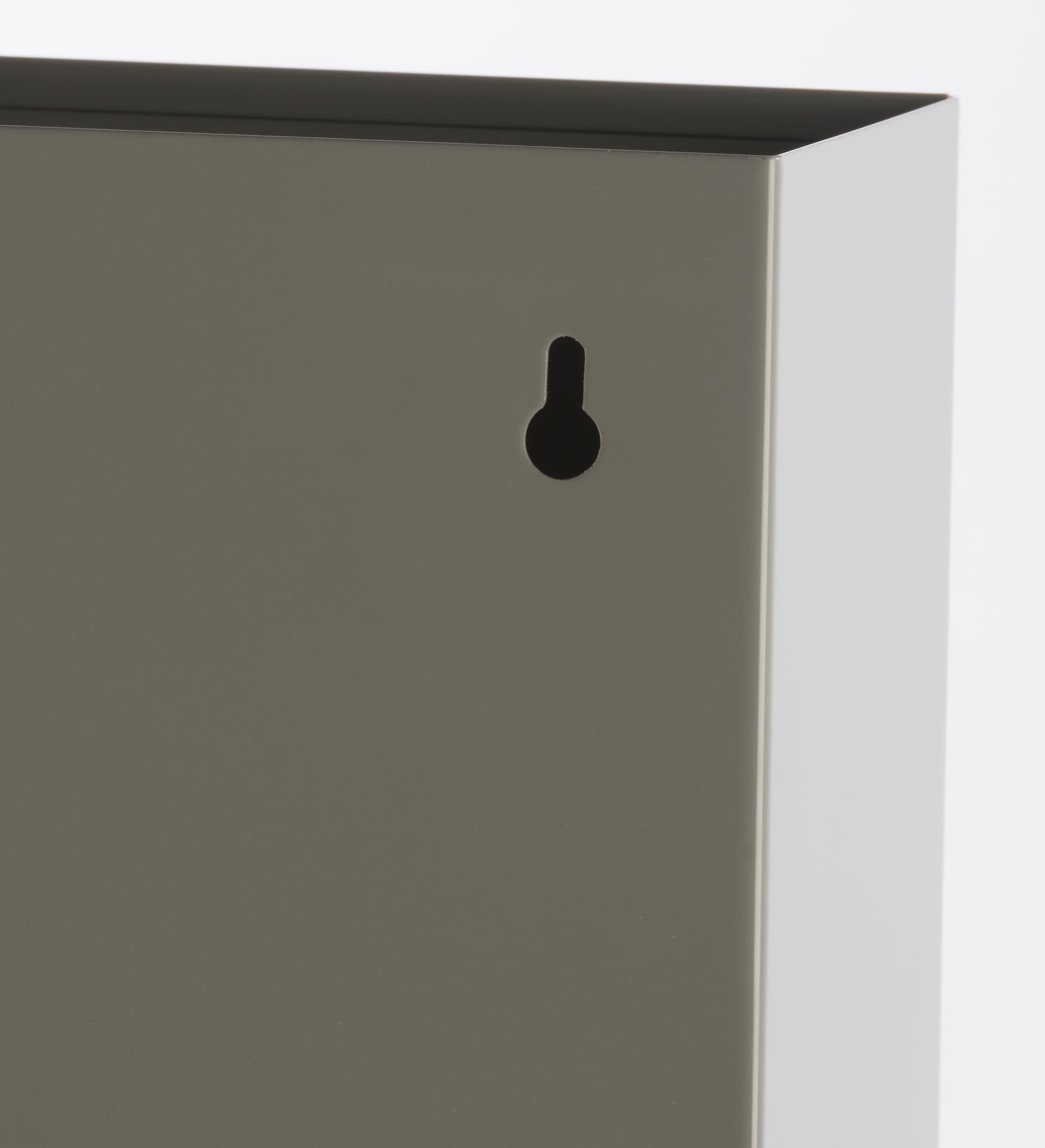 White steel wall file organizer features with key holes for mounting