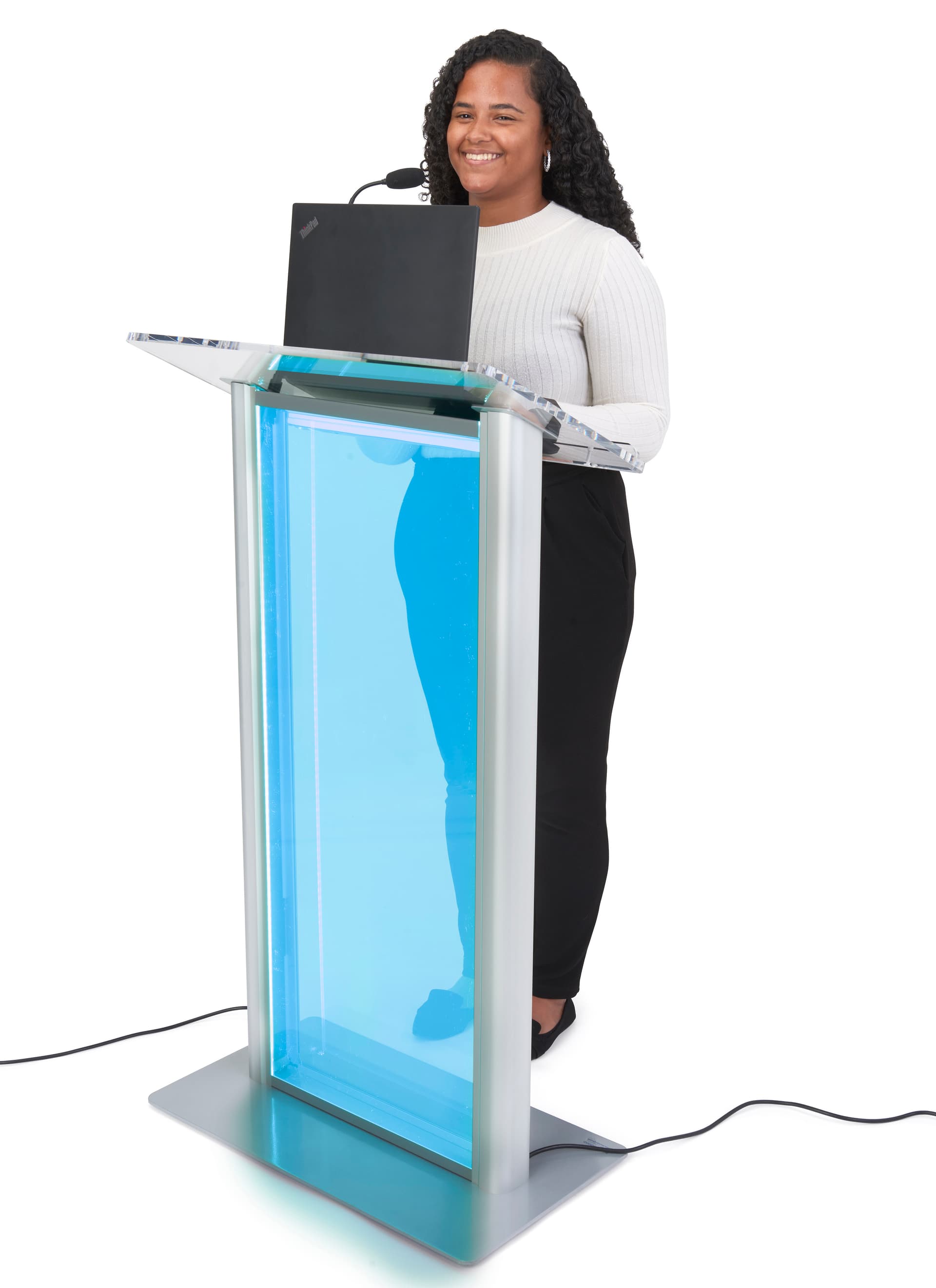 Illuminated clear acrylic podium has an angled counter