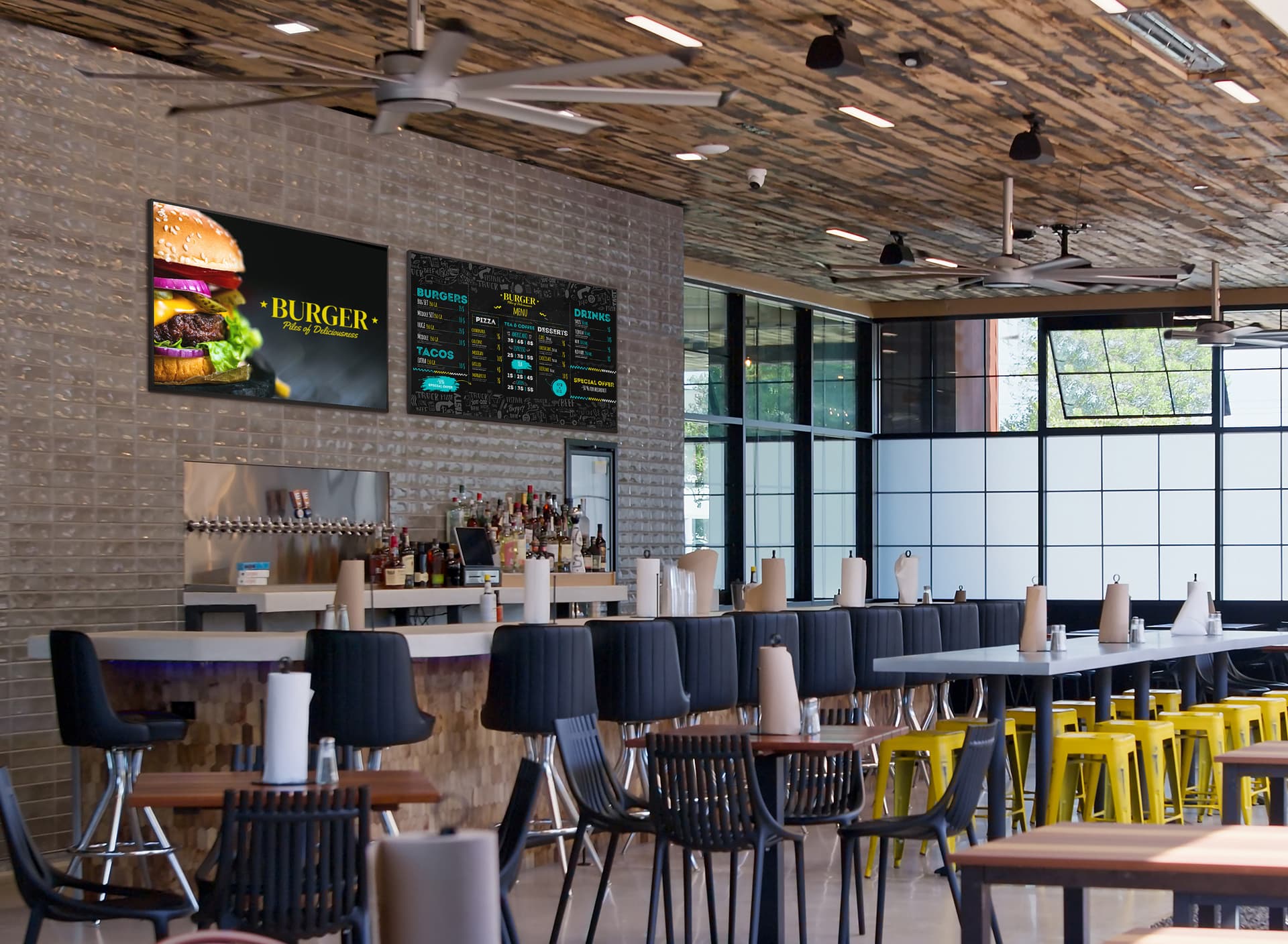 Digital advertising screen being used as a menu board in bar environment