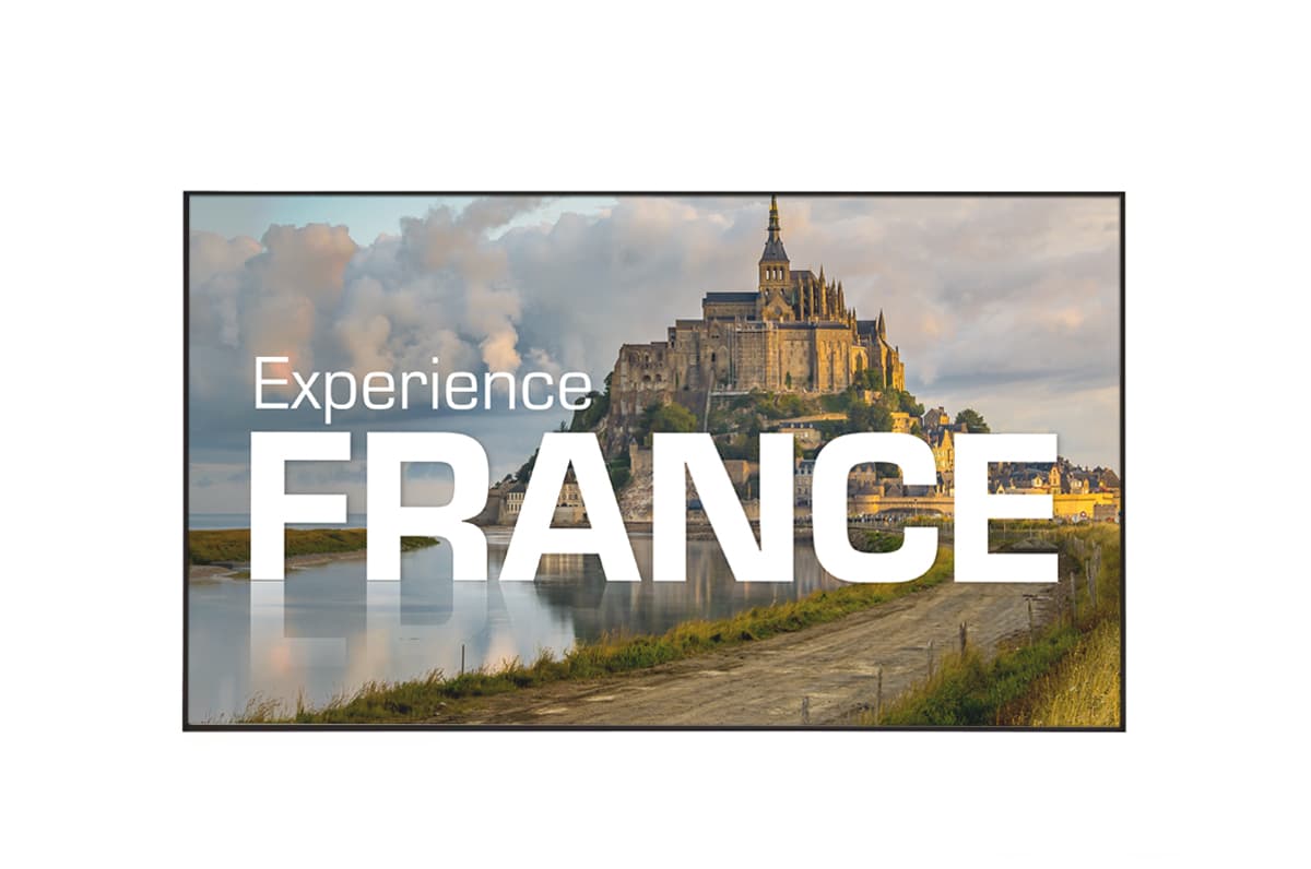 Digital advertising screen showcasing a graphic of a travel agency
