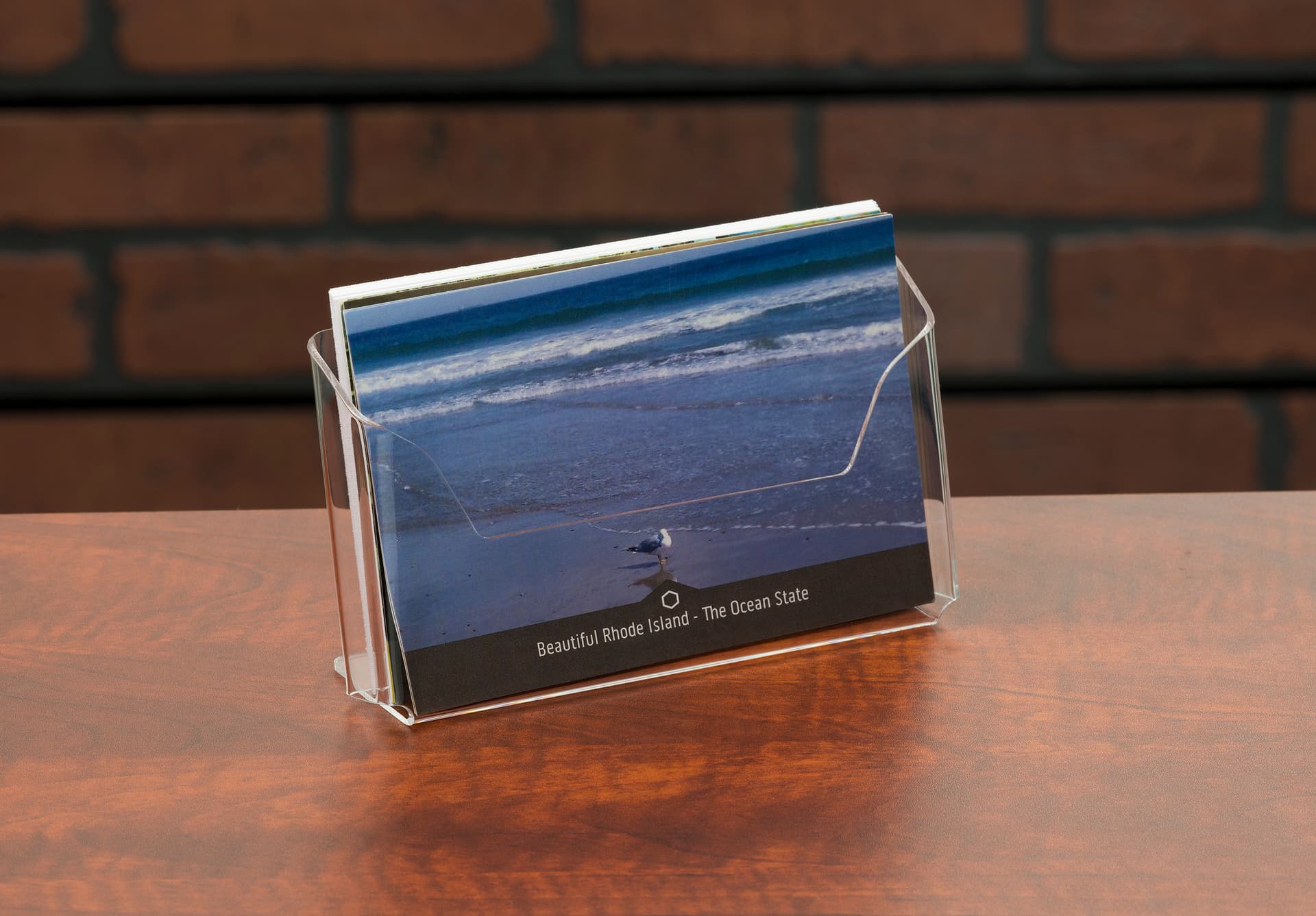 Post card pocket acrylic holder on table