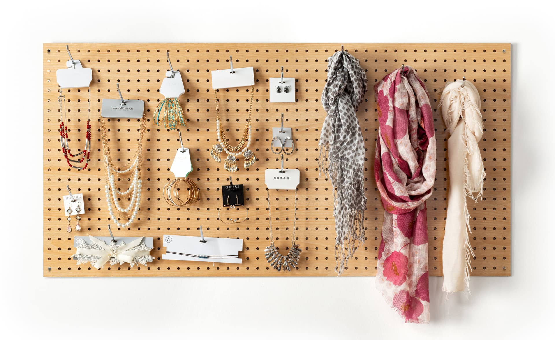 MDF pegboard retail display with included mounting hardware