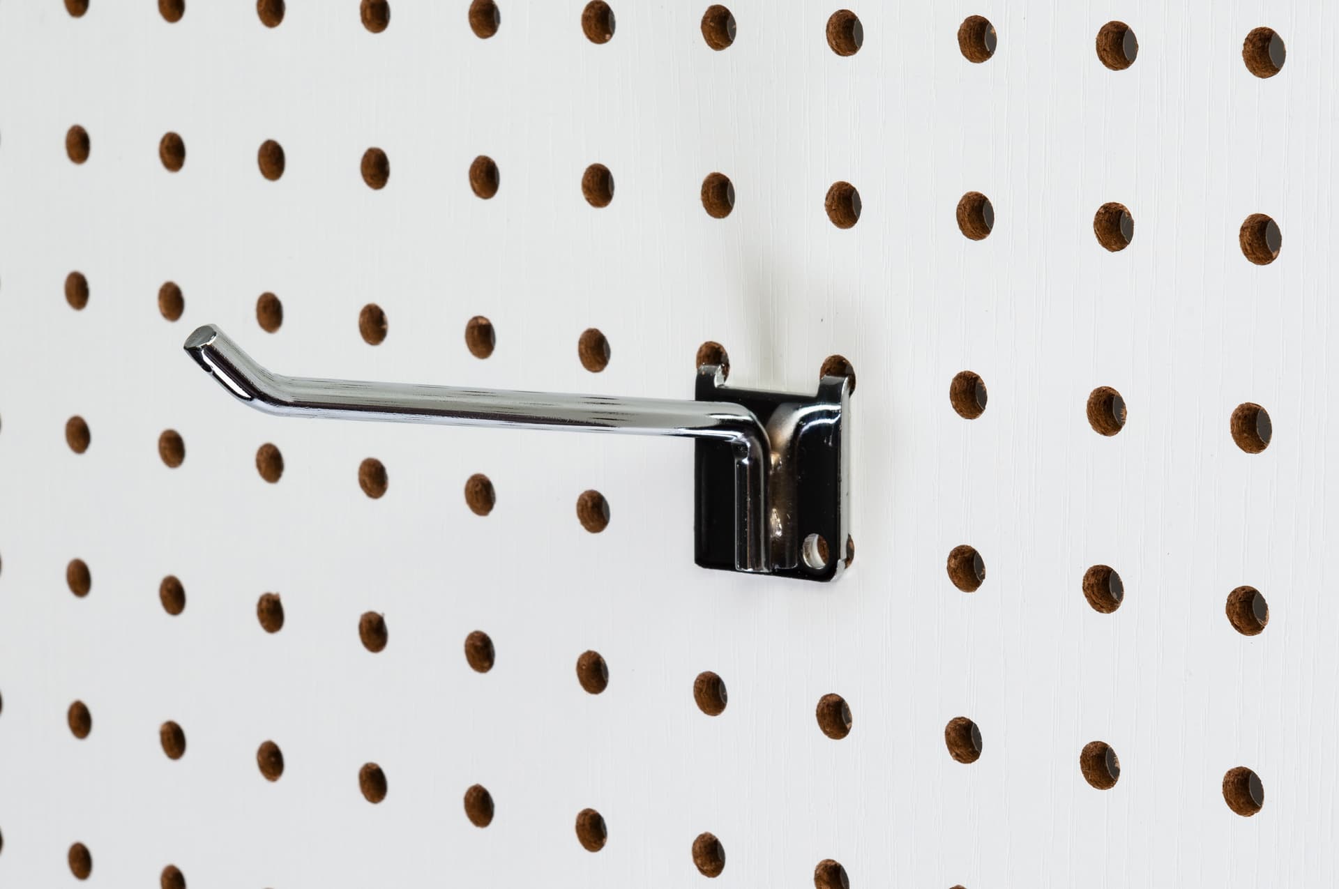 Large white pegboard for hook accessories