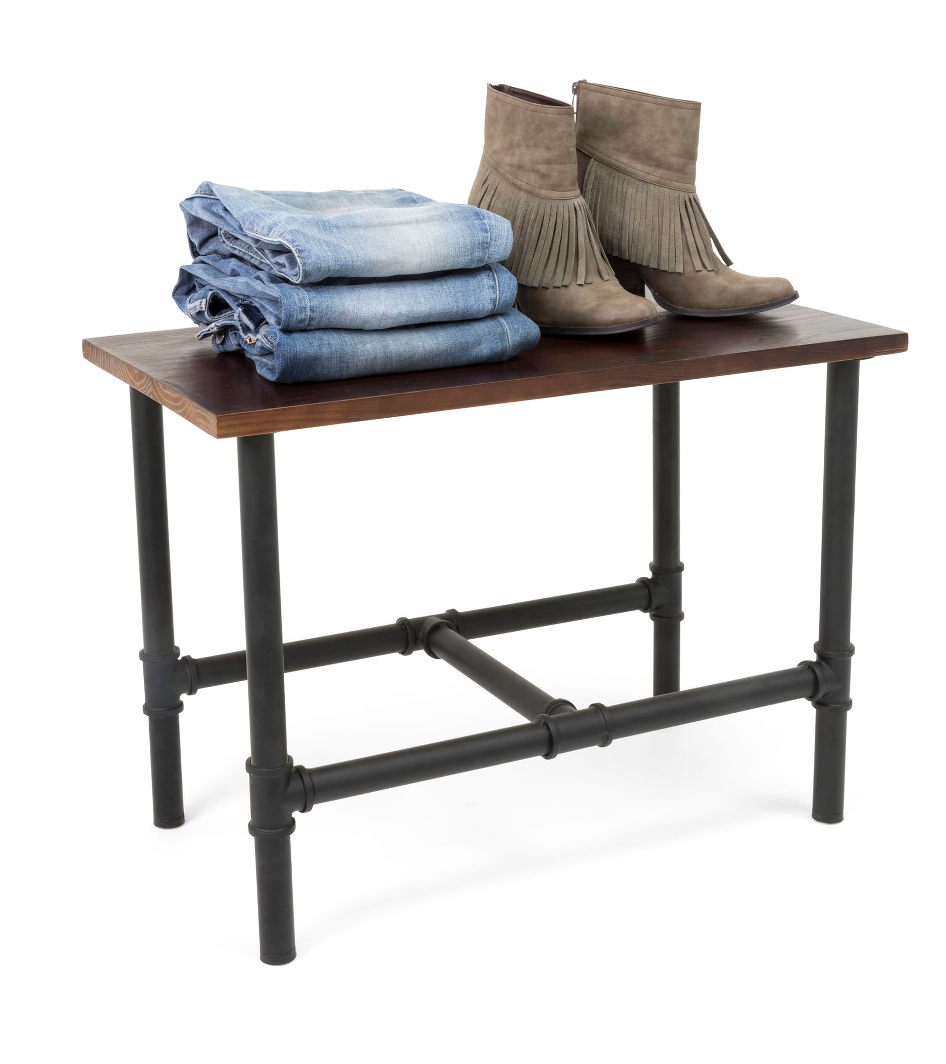 Small Pipe Display Table Showcasing Folded Jeans